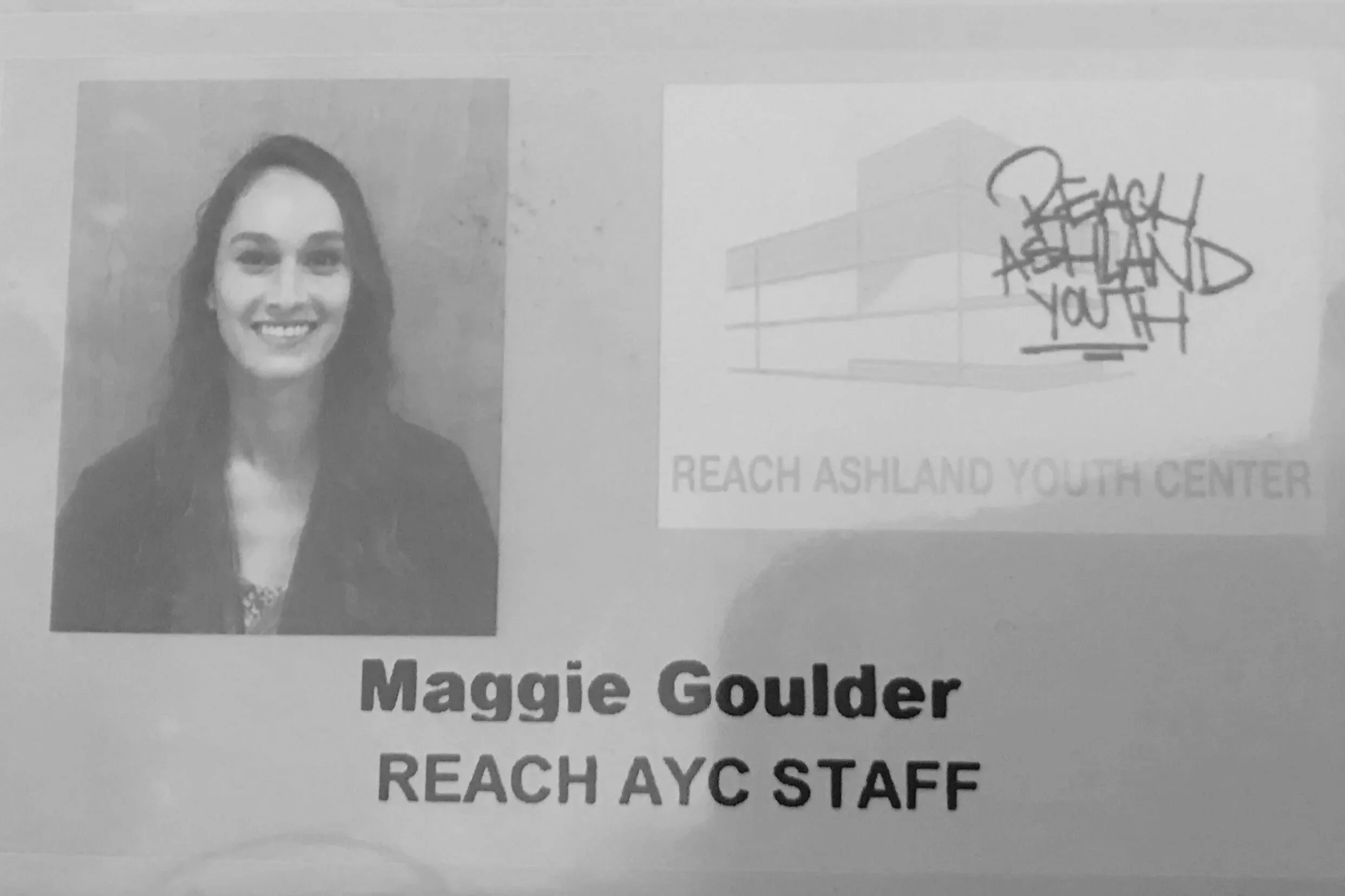 A black and white image of Maggie Goulder's staff ID card at Reach Ashland Youth Center