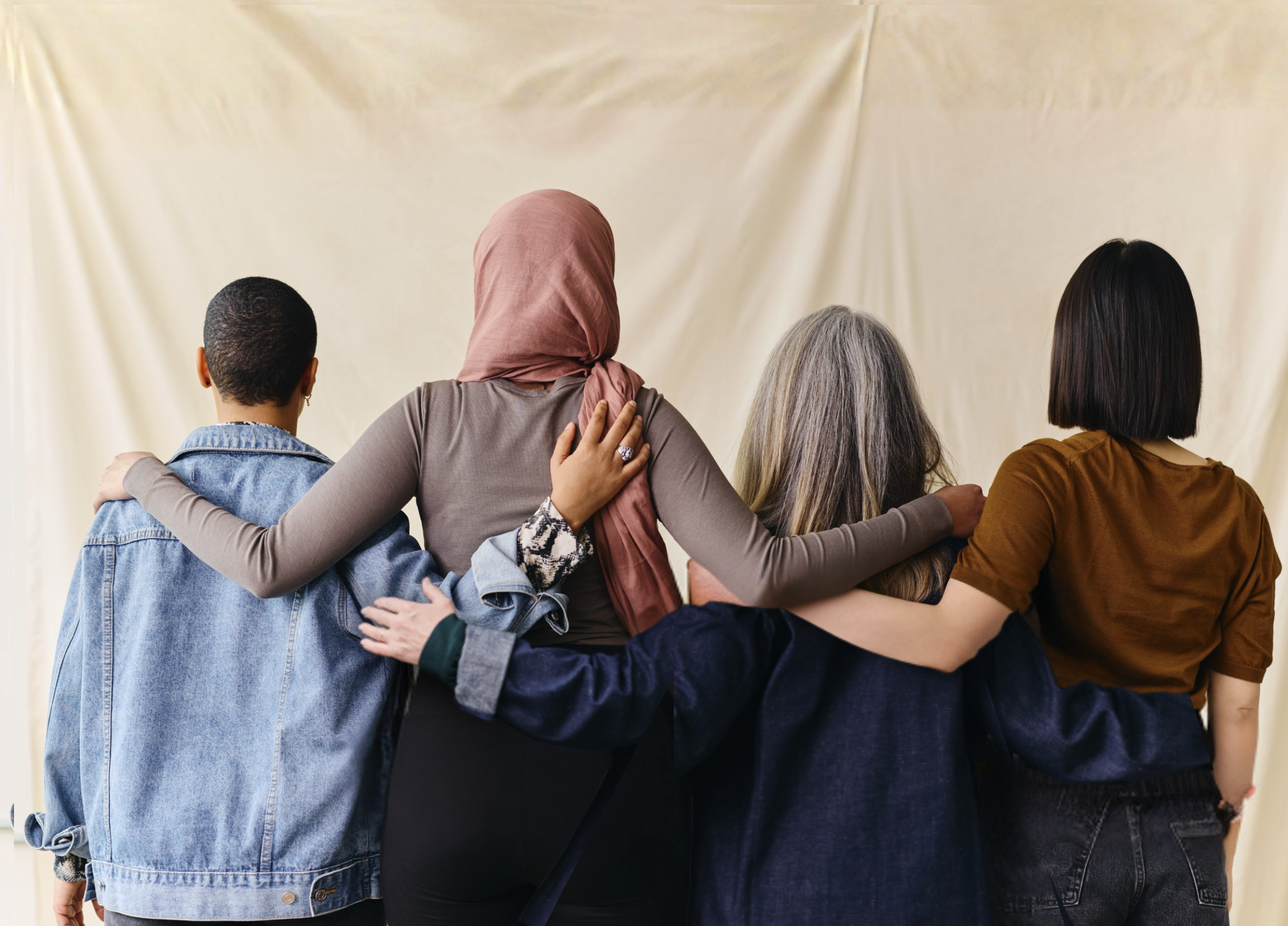 Women with their arms around each other