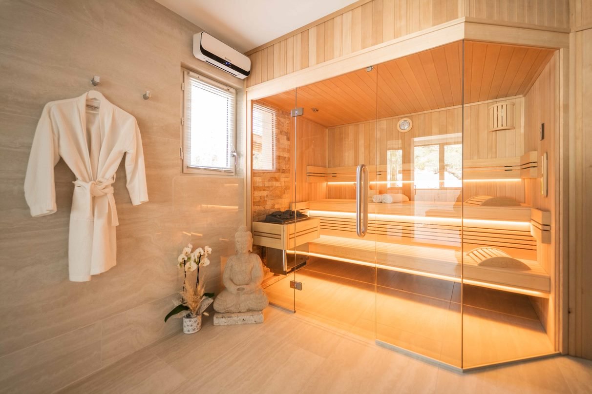 Custom traditional sauna designed, manufactured, and built by Alpha Wellness Sensations.