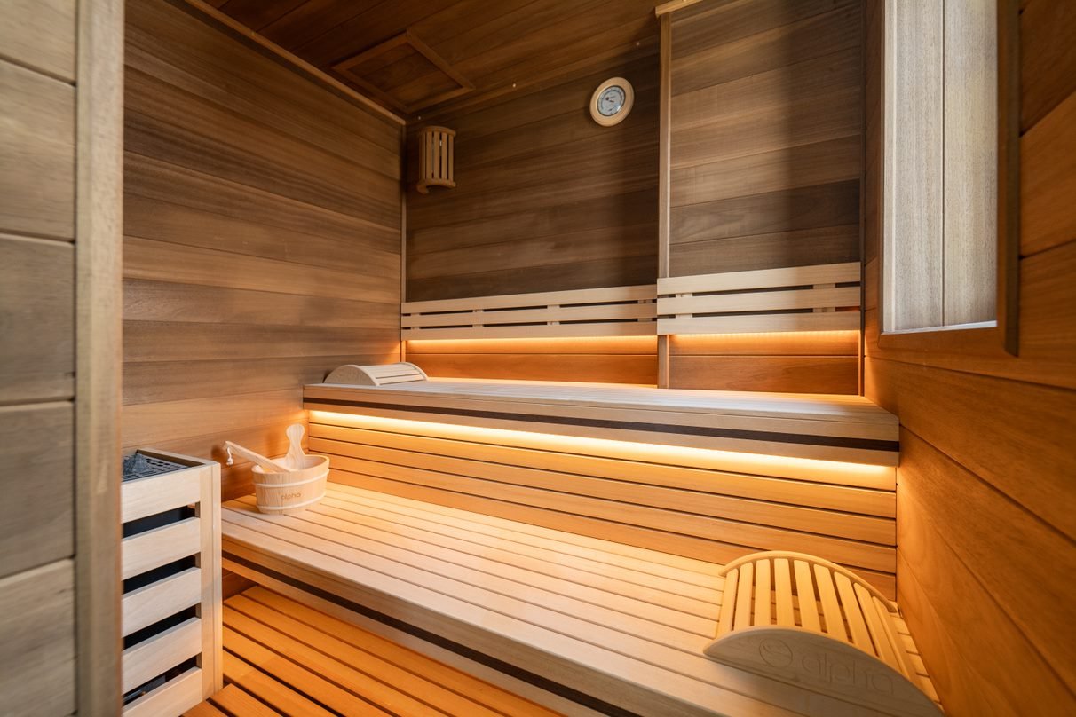 Custom traditional sauna designed, manufactured, and built by Alpha Wellness Sensations.