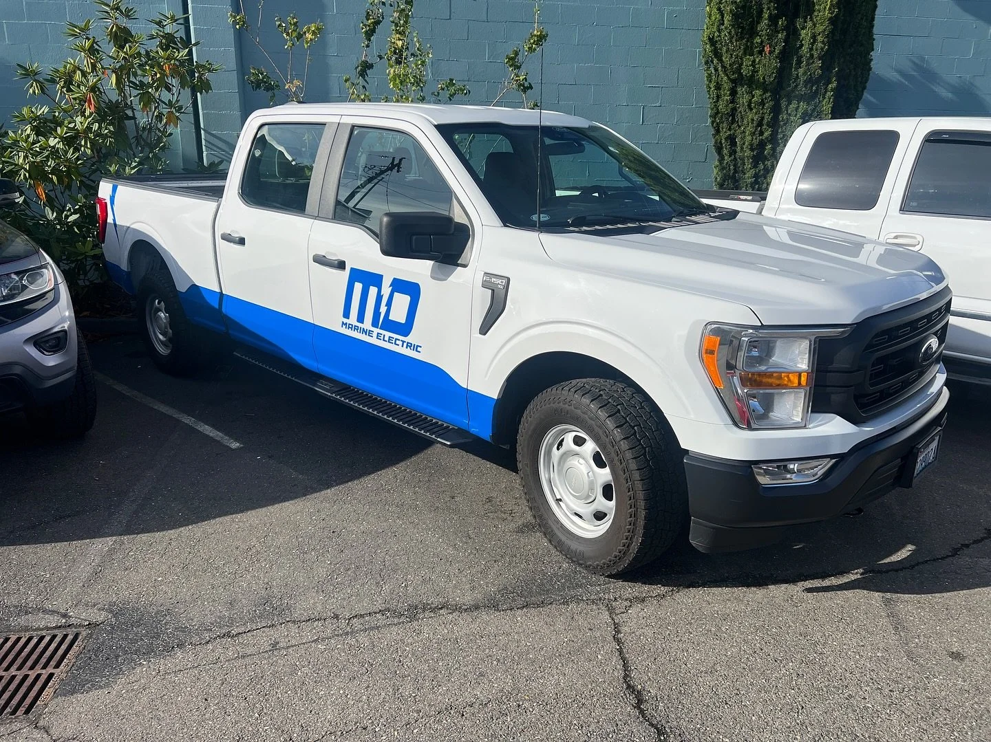 MD Electric Group fleet graphics. Go check these guys out for all of your commercial electric, commercial marine electric, or electrical engineering needs.  #signs #graphics #branding #vinylwrap #vehiclewrap #fleetwrap #electric #plotter #graphicdesi