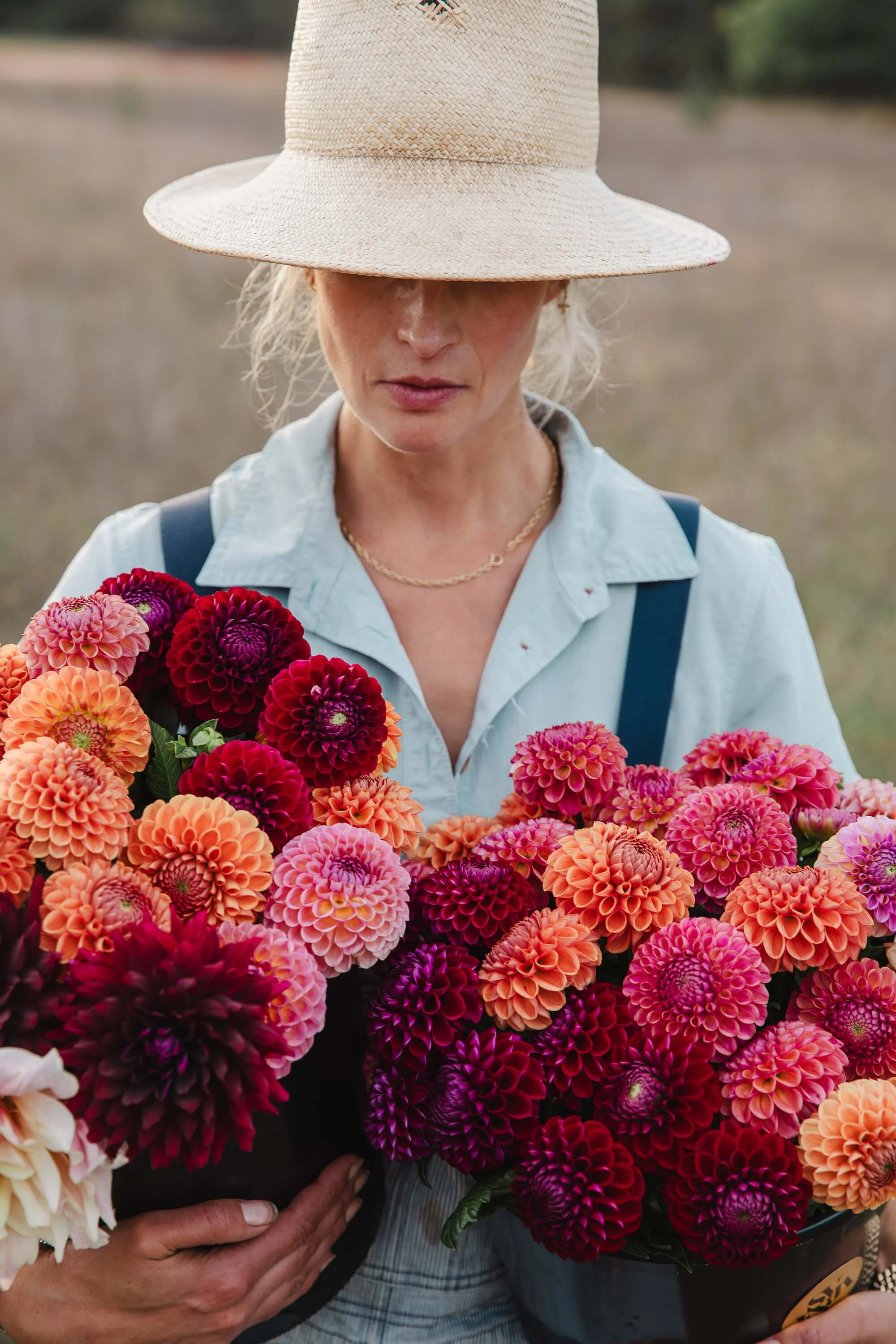 Svenja Botanicals portrait with buckets of dahlias.jpg