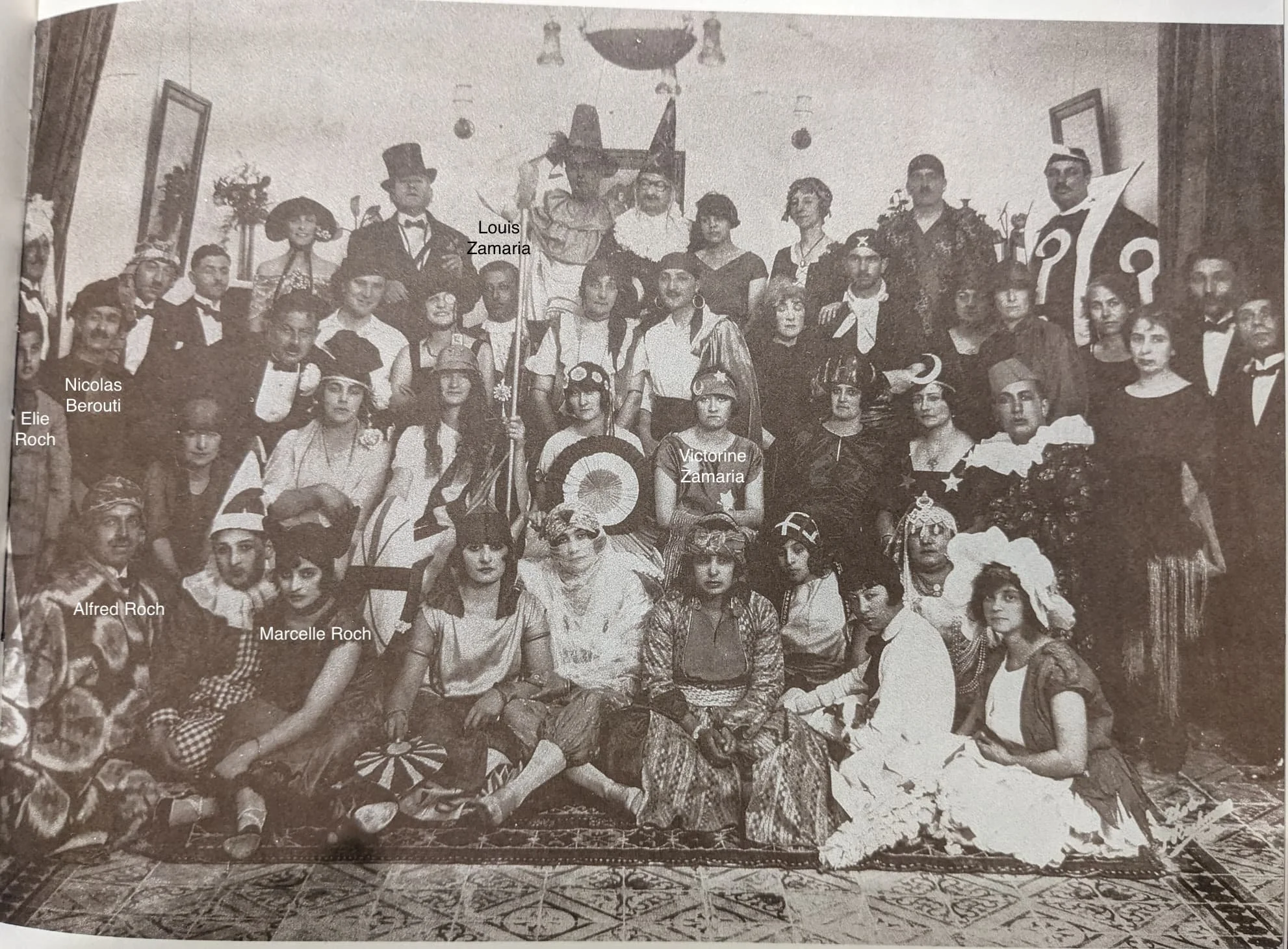Masquerade party at Alfred Roch's house, Jaffa, 1925. 
Other people in the picture include: Antoine Roch, Isabelle Roch, Loktania Roch, Eveline Roch, Arthur Roch, Adelaide Roch, Johnny Rohy Al-Khalidi, and Edmond Roch. 
Source: يافا عطر مدينة (“Jaffa