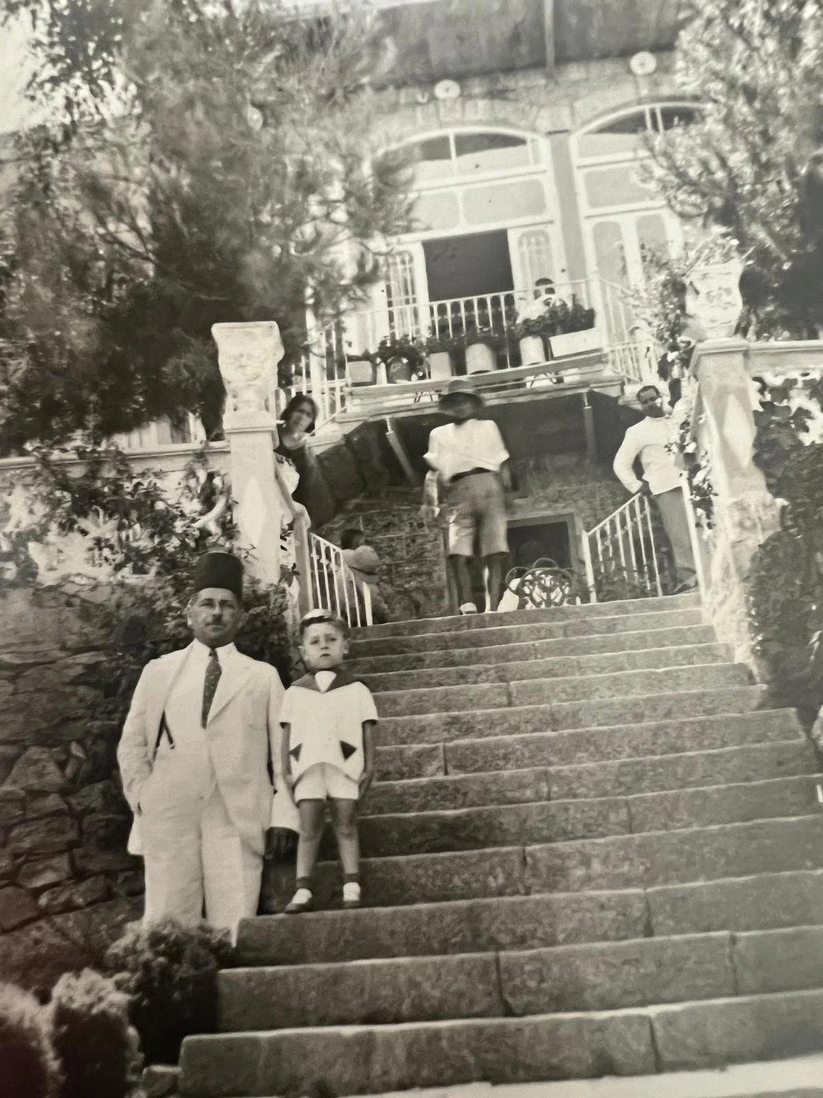 The young child in front is Alexandre Beyrouti. I suspect that the house in the background was inhabited by one of the Berouti families. I wonder if it is still standing today.