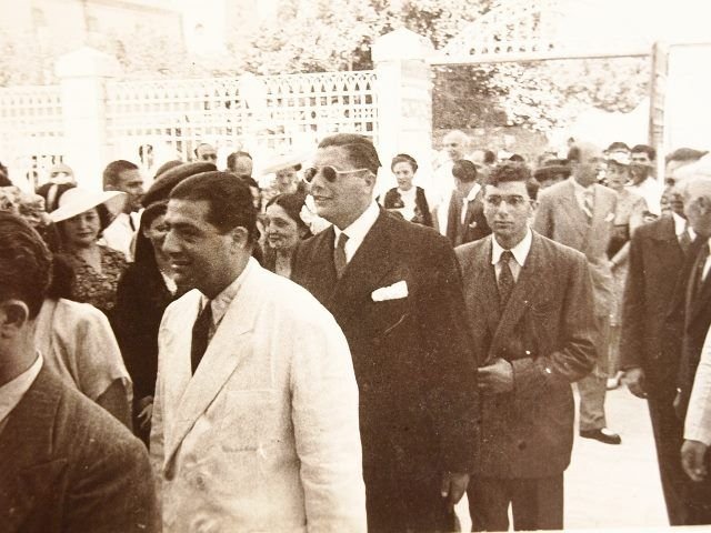 Charles Emile Berouti (in the white suit). Behind him are Alexandre Berouti and Antoine Gelat, at George and Leyla's wedding, St. Anthony's Latin Church, Jaffa, 1946.