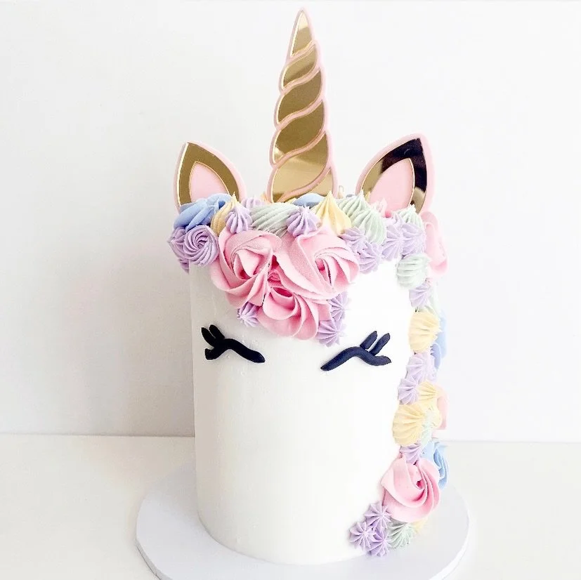 Past unicorn cake 🩷💚🩵💛💜

#unicorncake