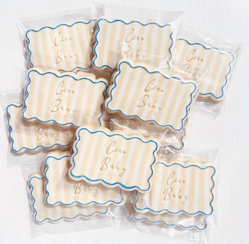 Stripe detail on these wavy rectangle baby shower cookies 💙🍼
