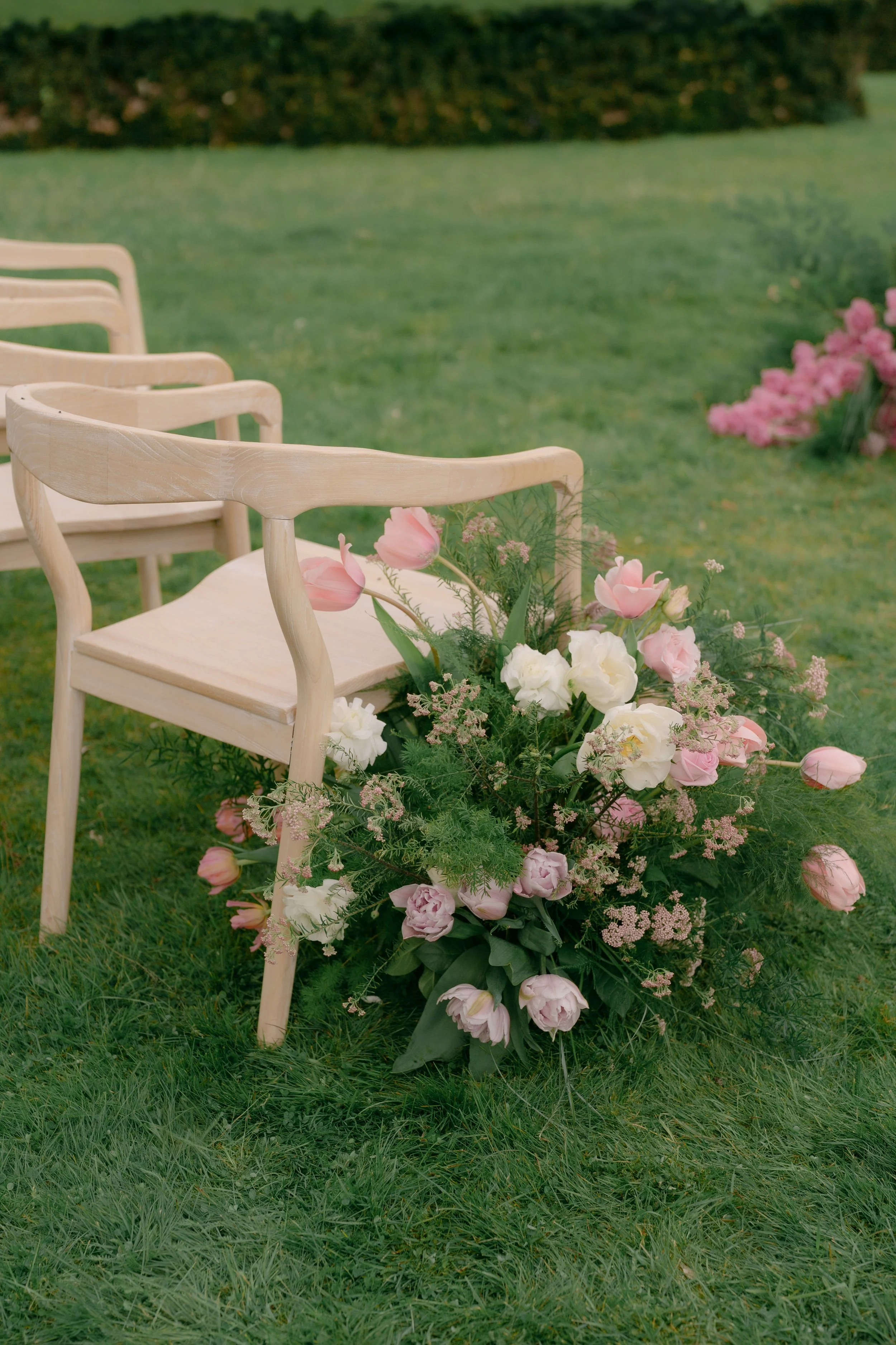 Outdoor wedding ceremony aisle meadow flowers