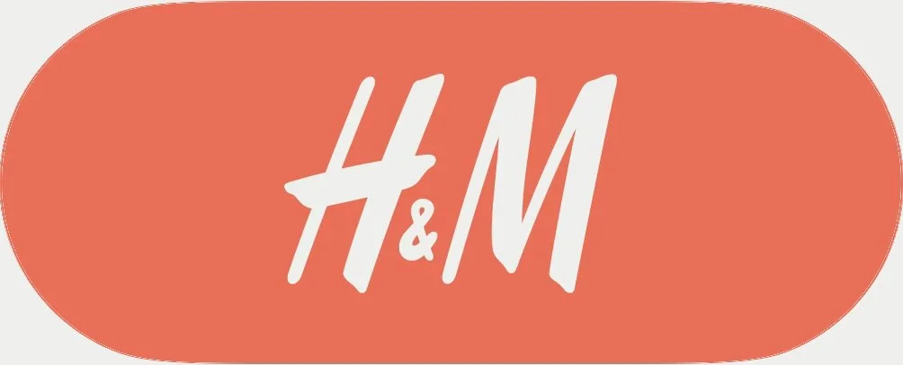 H&M logo on an orange oval background.