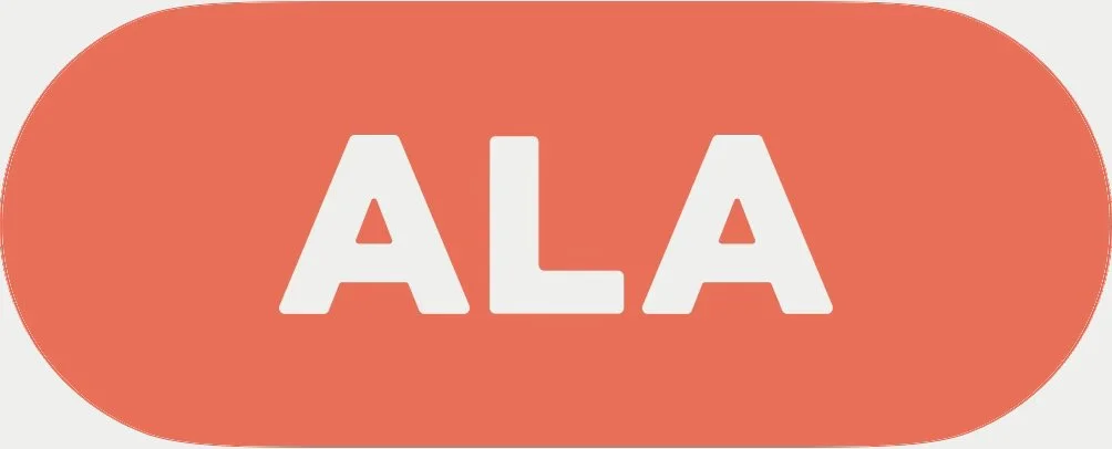 Red oval button with white text that reads 'ALA'.