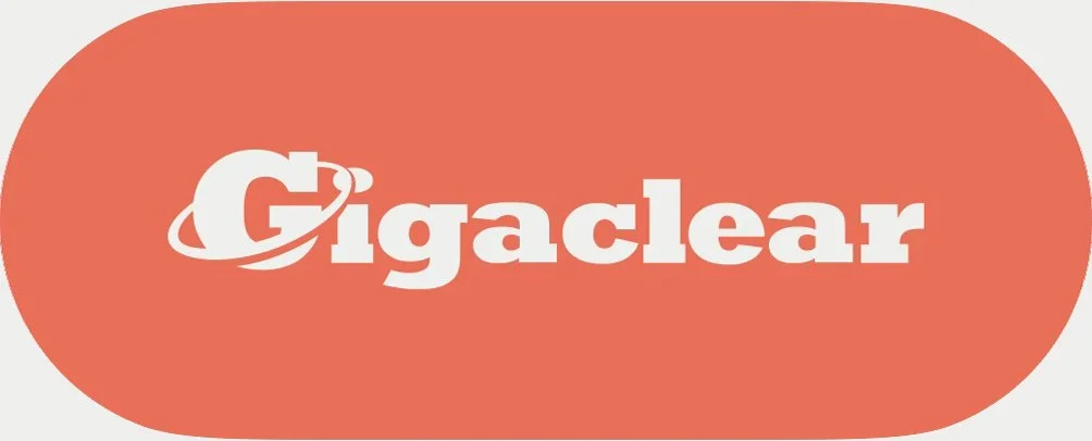 The Gigaclear logo with a white 'G' and a planet ring design on a red-orange oval background.