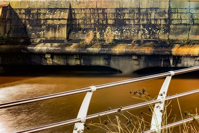 This is an image of the same infall of the previous photo in flood almost completely submerged.