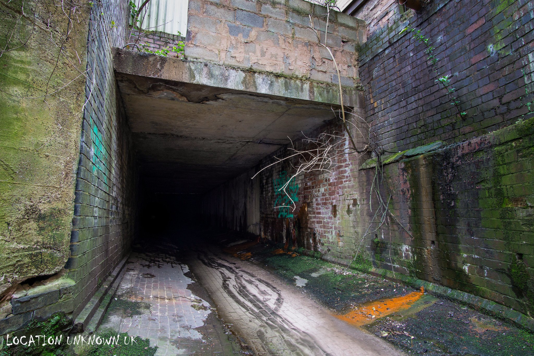 Passing derelict mills in another open air section of the brook.