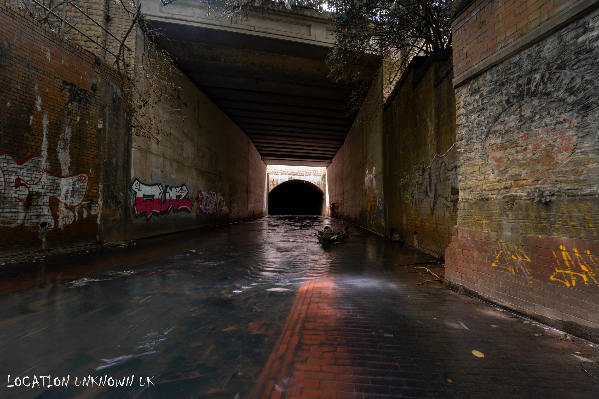 Above is the main road and up ahead is the start of the culvert.