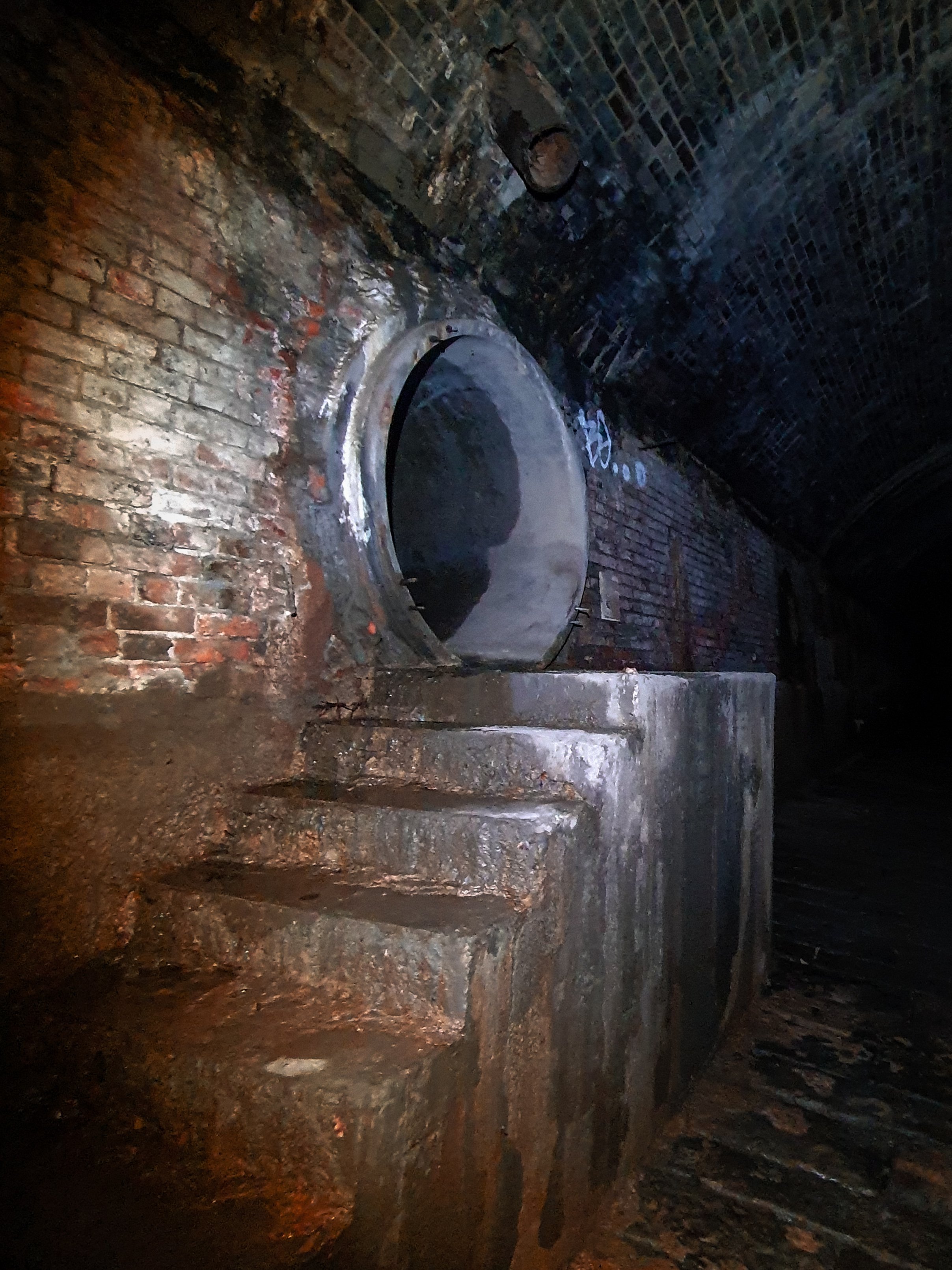 Through this concrete pipe is a large inspection shaft.