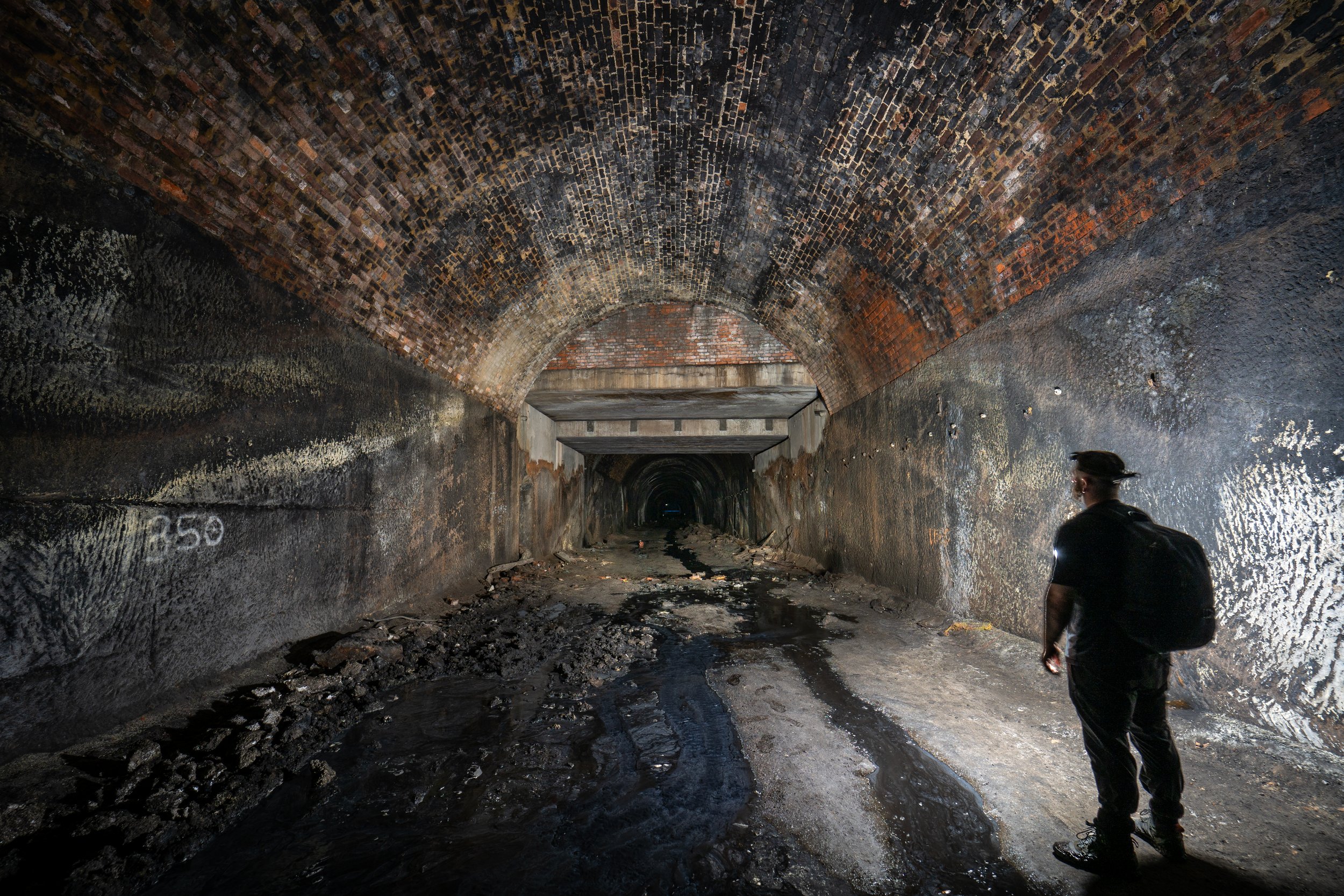 The concrete passage intersecting the tunnel is actually the Mersey rail.