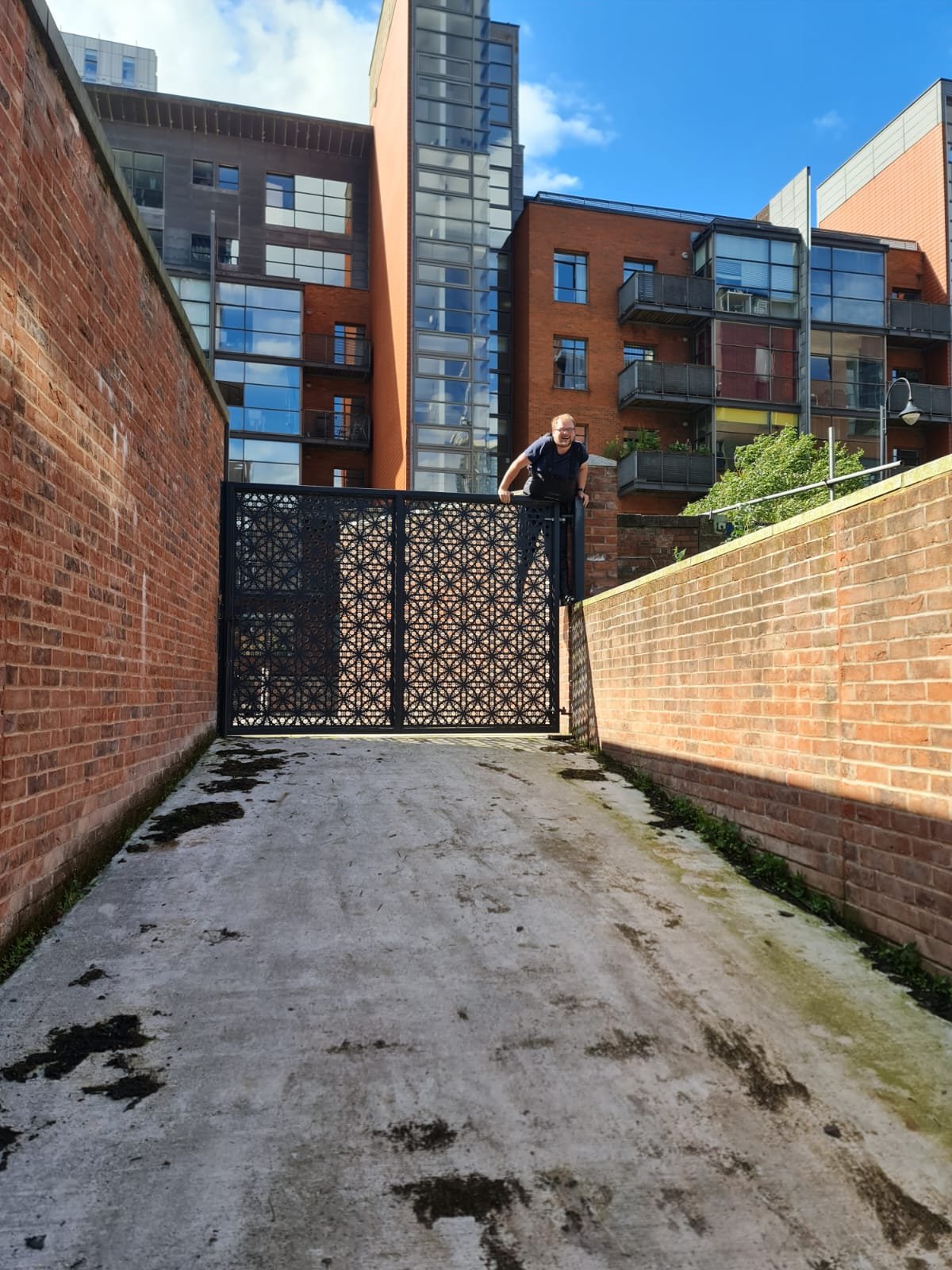 A wild Gronk scaling the fence in waders.