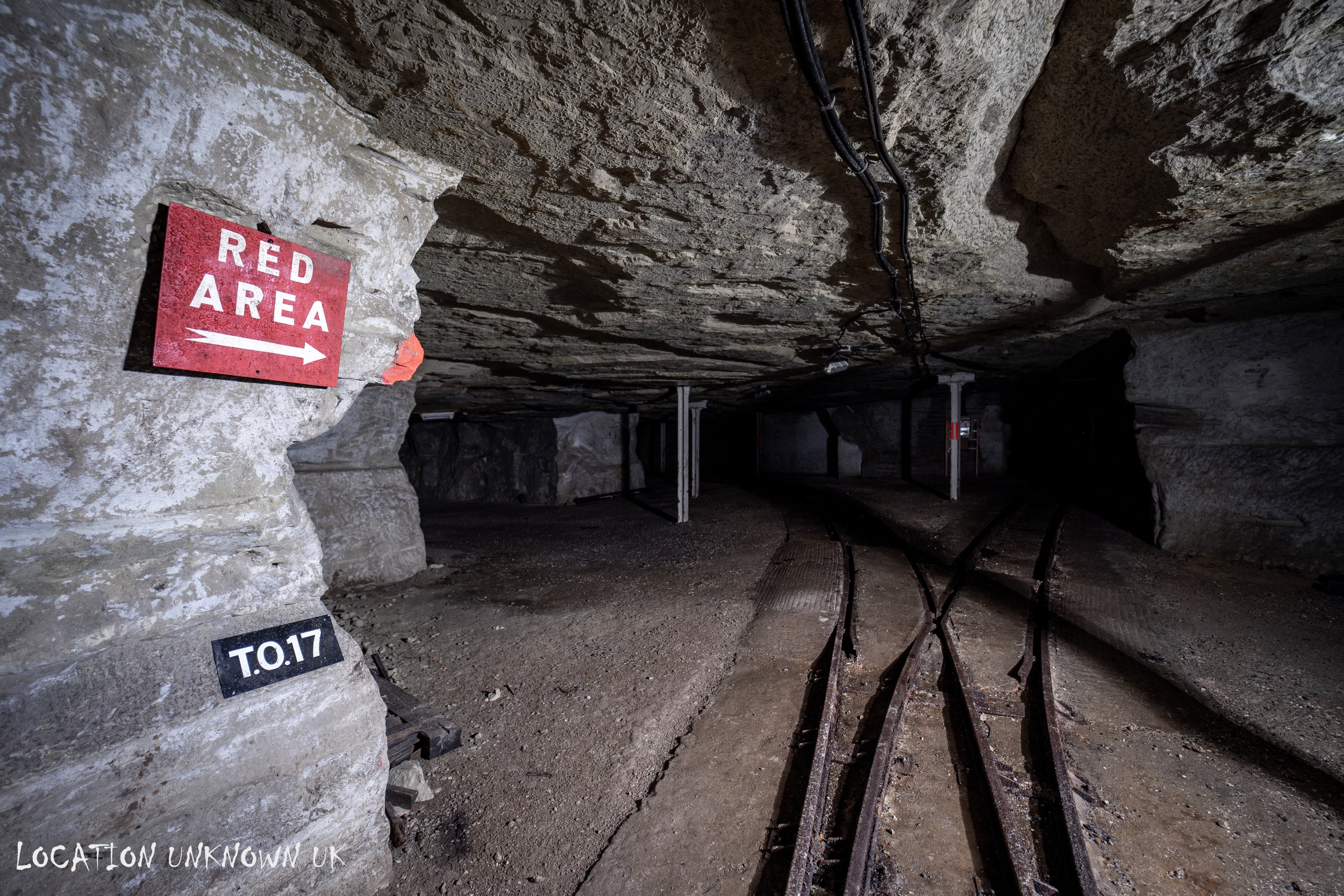 The ‘red area’ sign is in relation to the higher hazardous ordnance in storage.