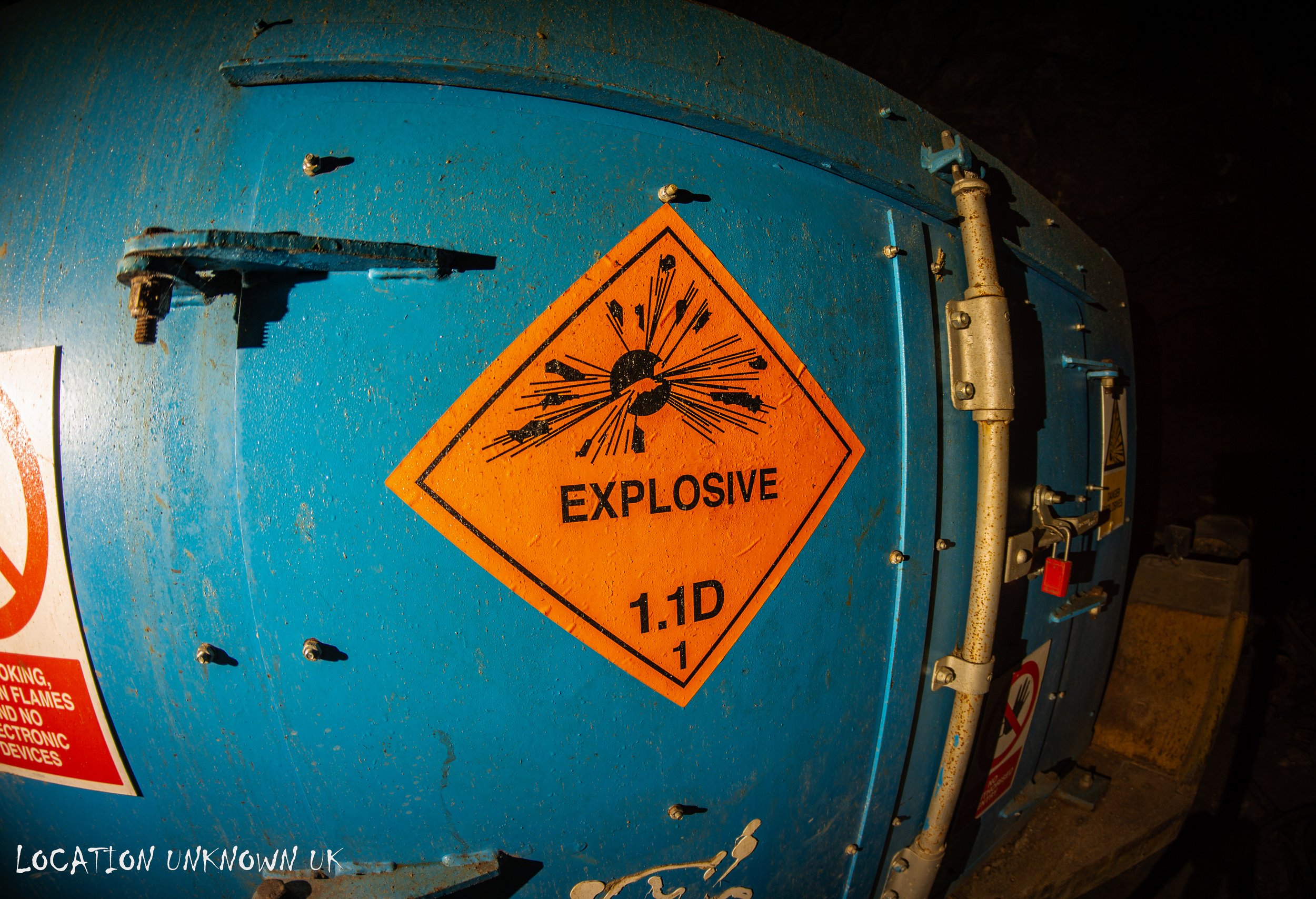 Kept inside a secure safe explosives could be transported to different areas of the mine for blasting purposes and the help push new drives... and yes that is one of those cheap plastic locks that can be booted off with ease.