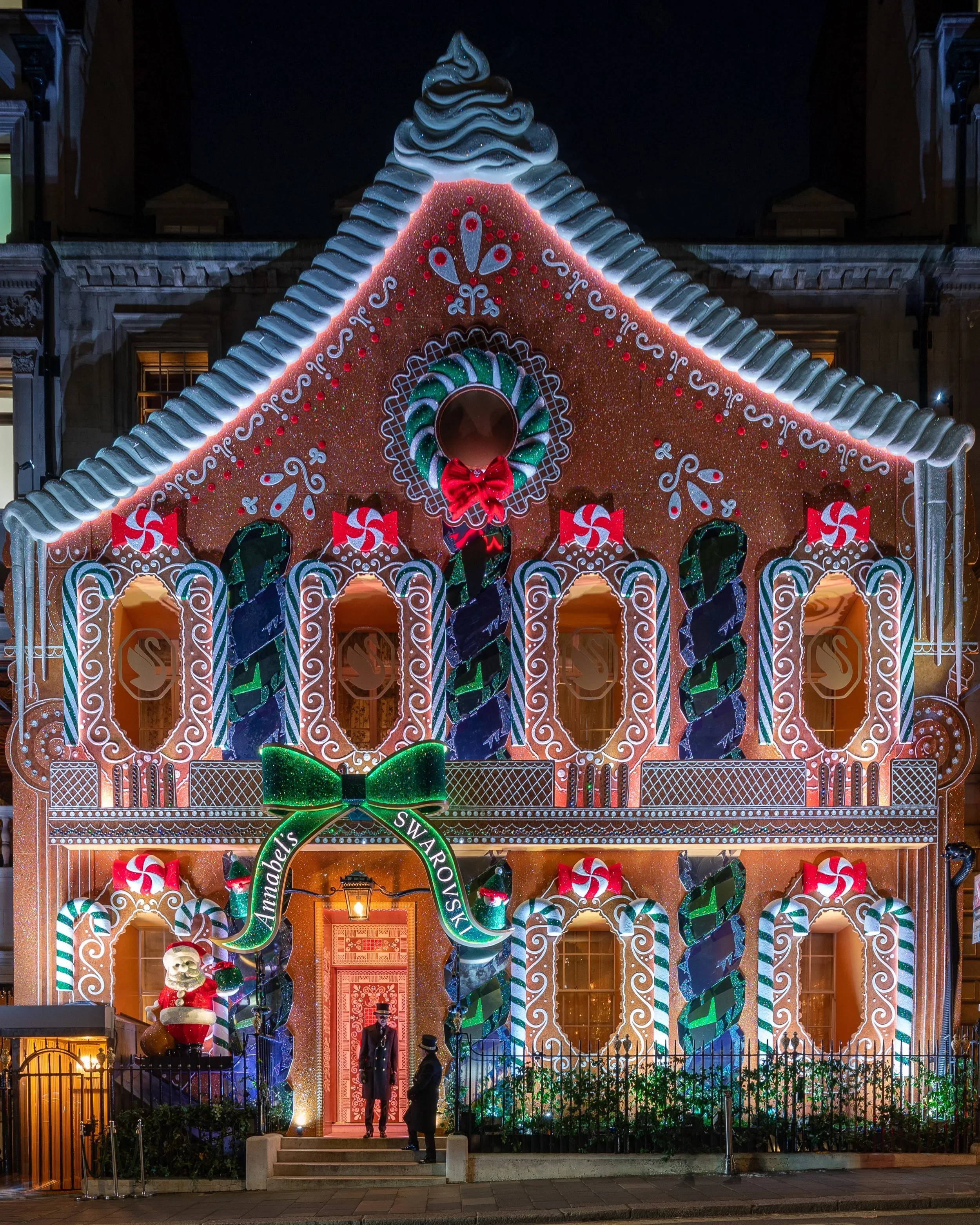 Annabel Christmas display in mayfair gingerbread house _s+x+Swarovski+Facade+Night.jpg.webp