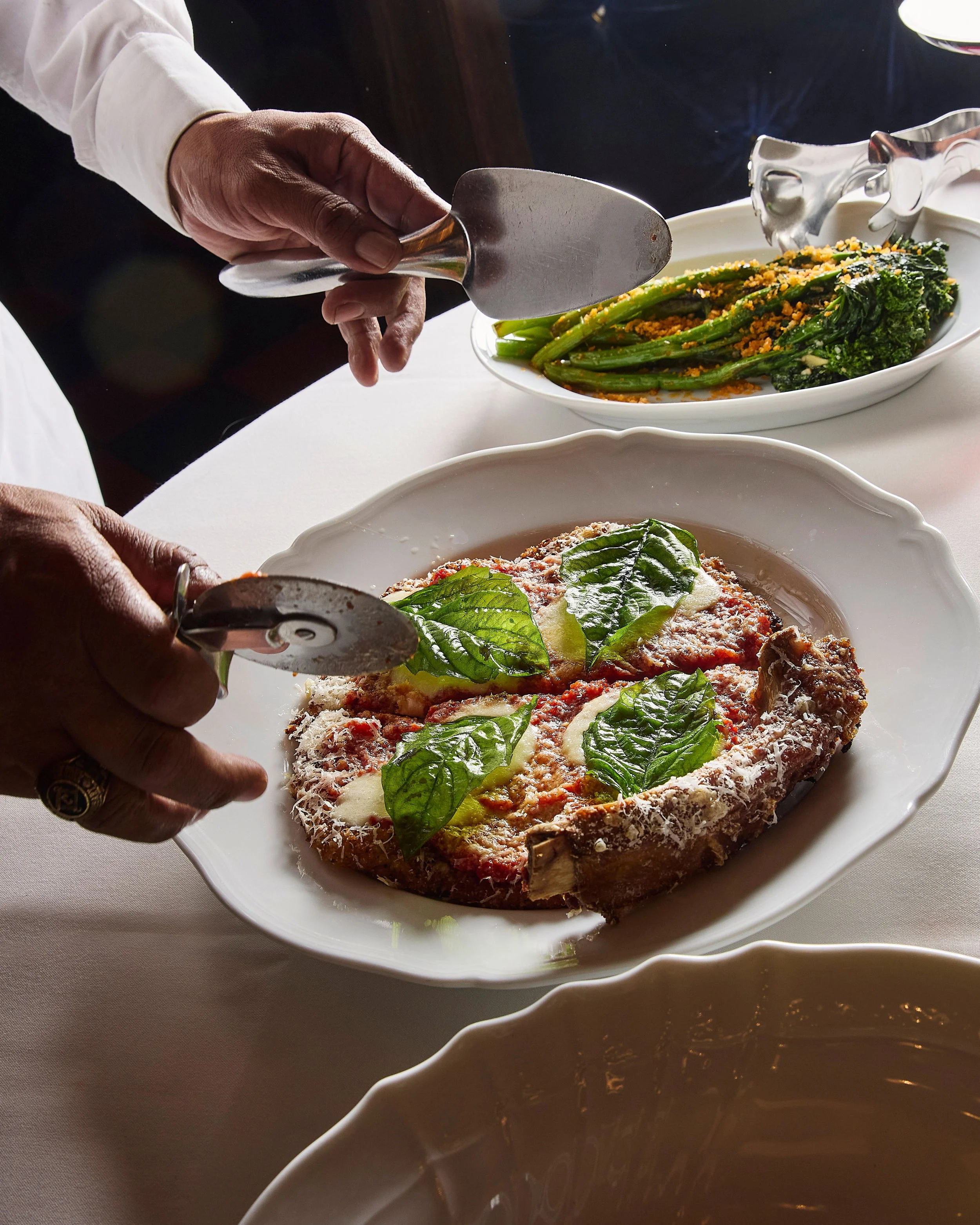 Carbone Mayfair restaurant food Cutting Veal Parm.jpg