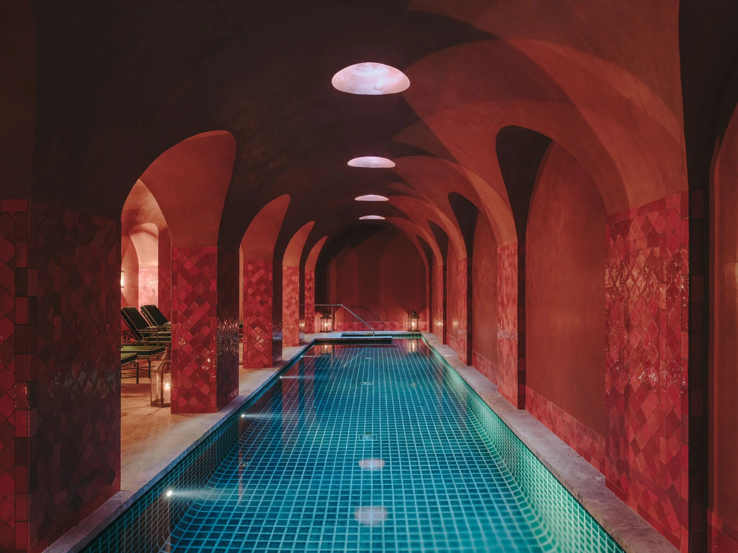Son Net Hotel_Spa indoor swimming pool burgunday red interior with arches (14).jpg