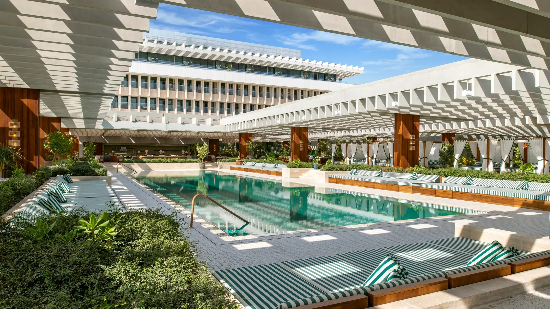 The Ned Doha Qatar outdoor are _Ned Doha Pool.jpg.webp