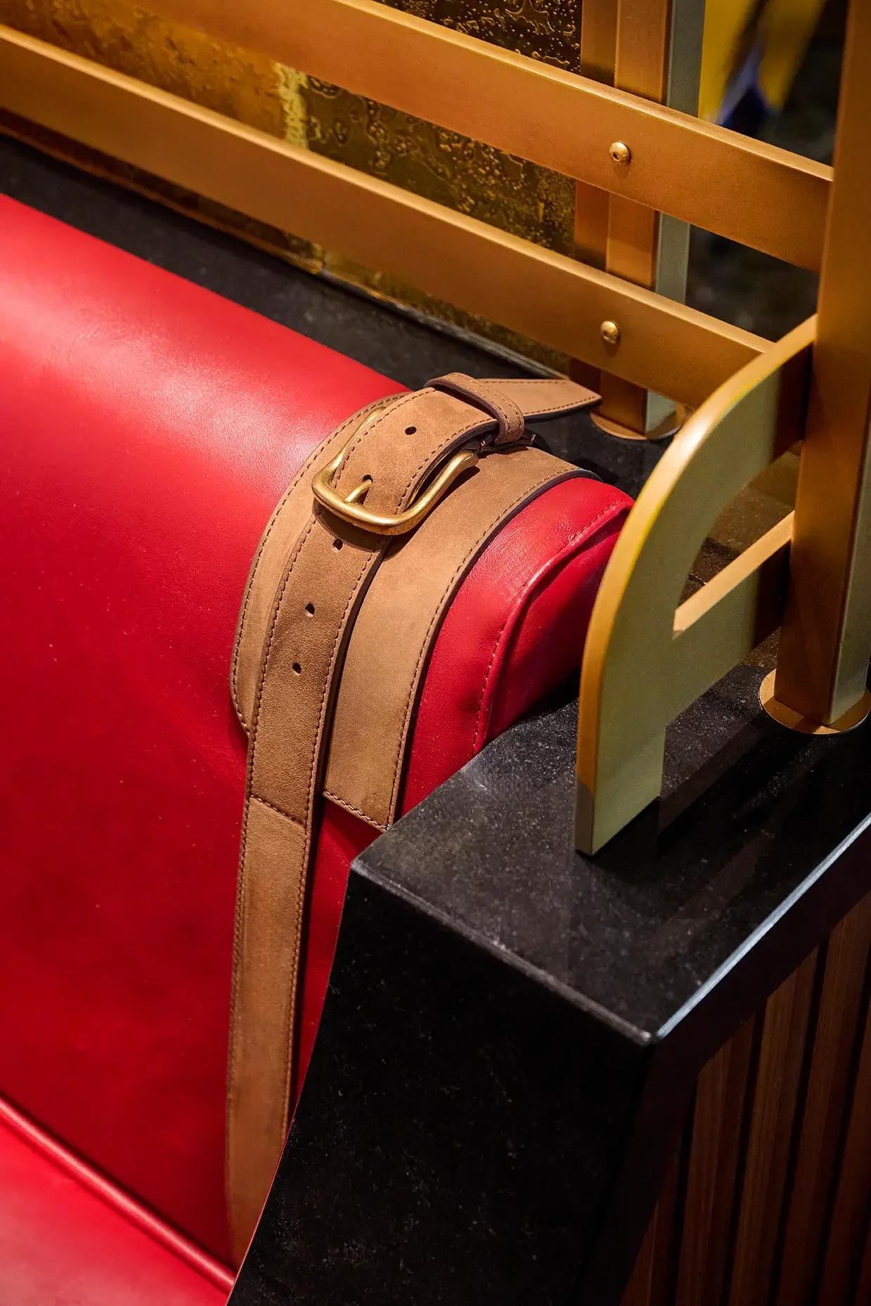 Langosteria_London Restaurant Interior Scheme  Red leather seating clost up.webp