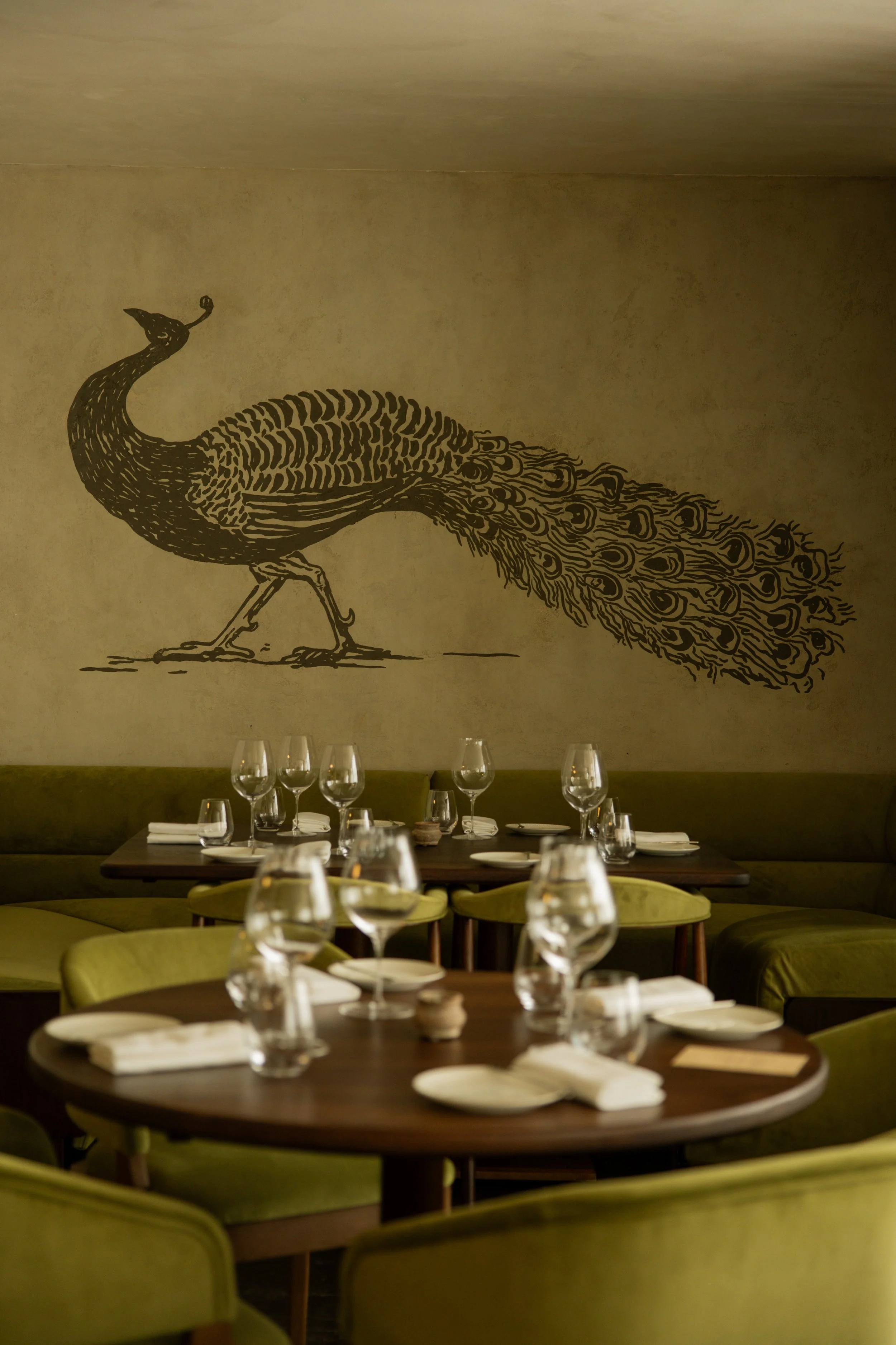 Oudh 1722 restaurant interior green peacock London Borough.jpg
