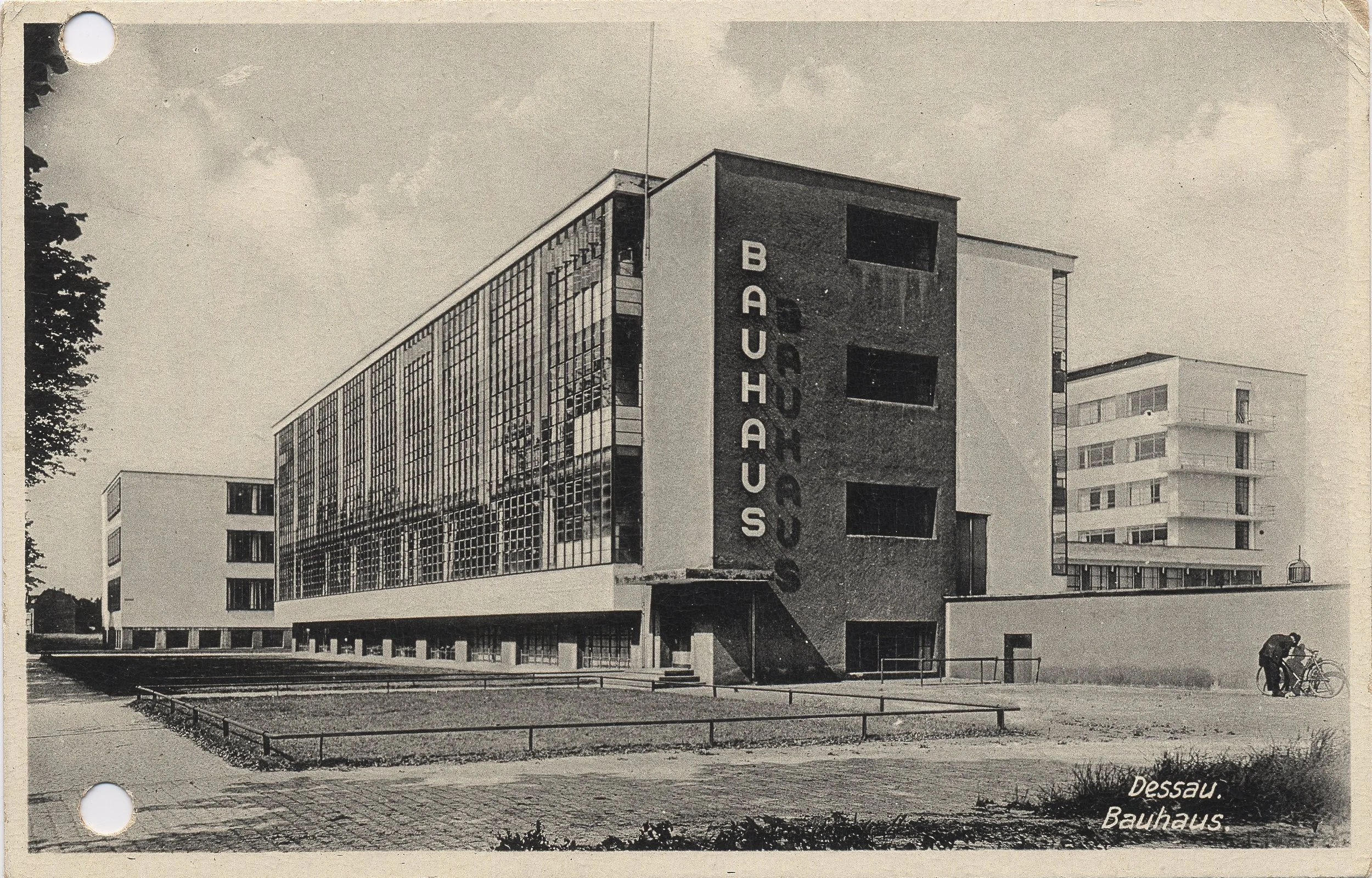 Black and white archival photograph of the Bauhaus building in Dessau, designed by Walter Gropius, 1927