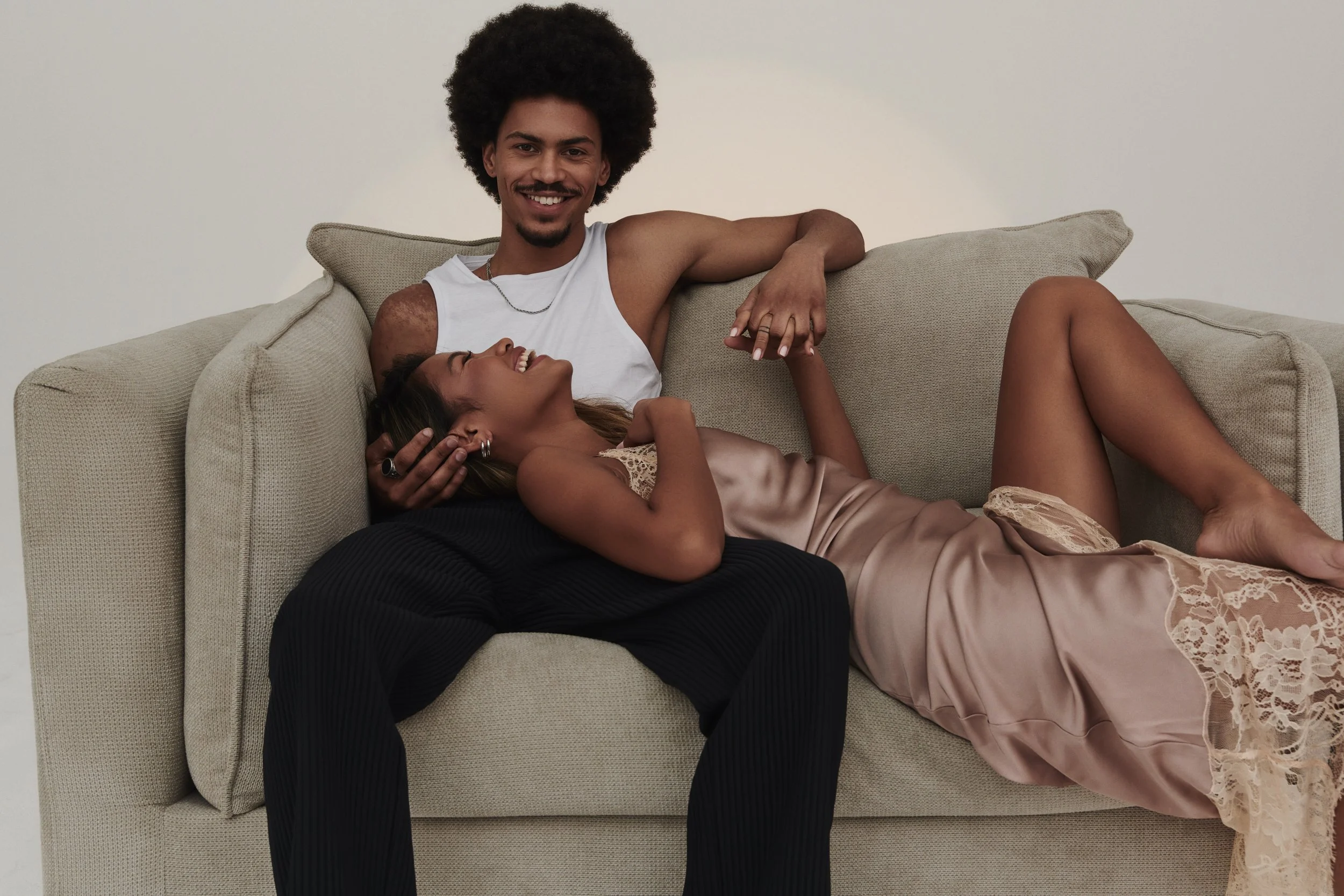 The sofa club couple, relaxing on sofa