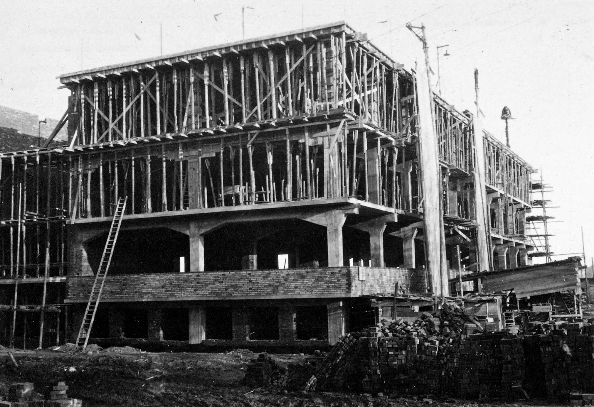 The Bauhaus Dessau building under construction in 1926, with exposed concrete framework