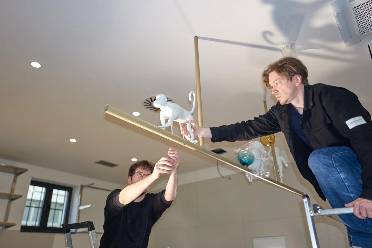 Jakub_Pollag designer, artist and Youtube why it Takes Time installing lighting.
