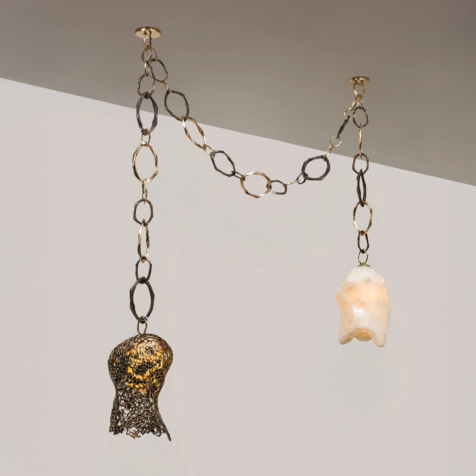 Catena Series Chandelier (2025)_By Markus Haase_Catena Series_Bronze, Onyx, LEDs_Photo Credit Simon Leung and Courtesy of Todd Merrill Studio.