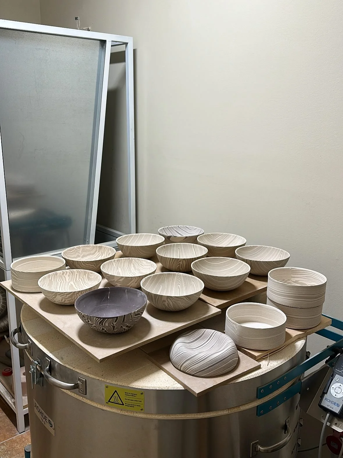 1. Last week I had to make sure my bisque bowls (that were freshly sanded and washed) dried overnight. So I took advantage of my glaze firing and stacked the bowls on top of the semi cooled kiln (it had around 150 degrees C at that point). Not sure w