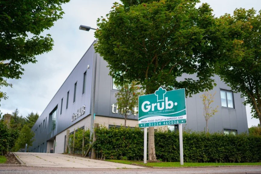 Exterior of Grub’s fresh food outlet at the Energy Hub in Aberdeen, showcasing their modern premises and catering services for local businesses and events.