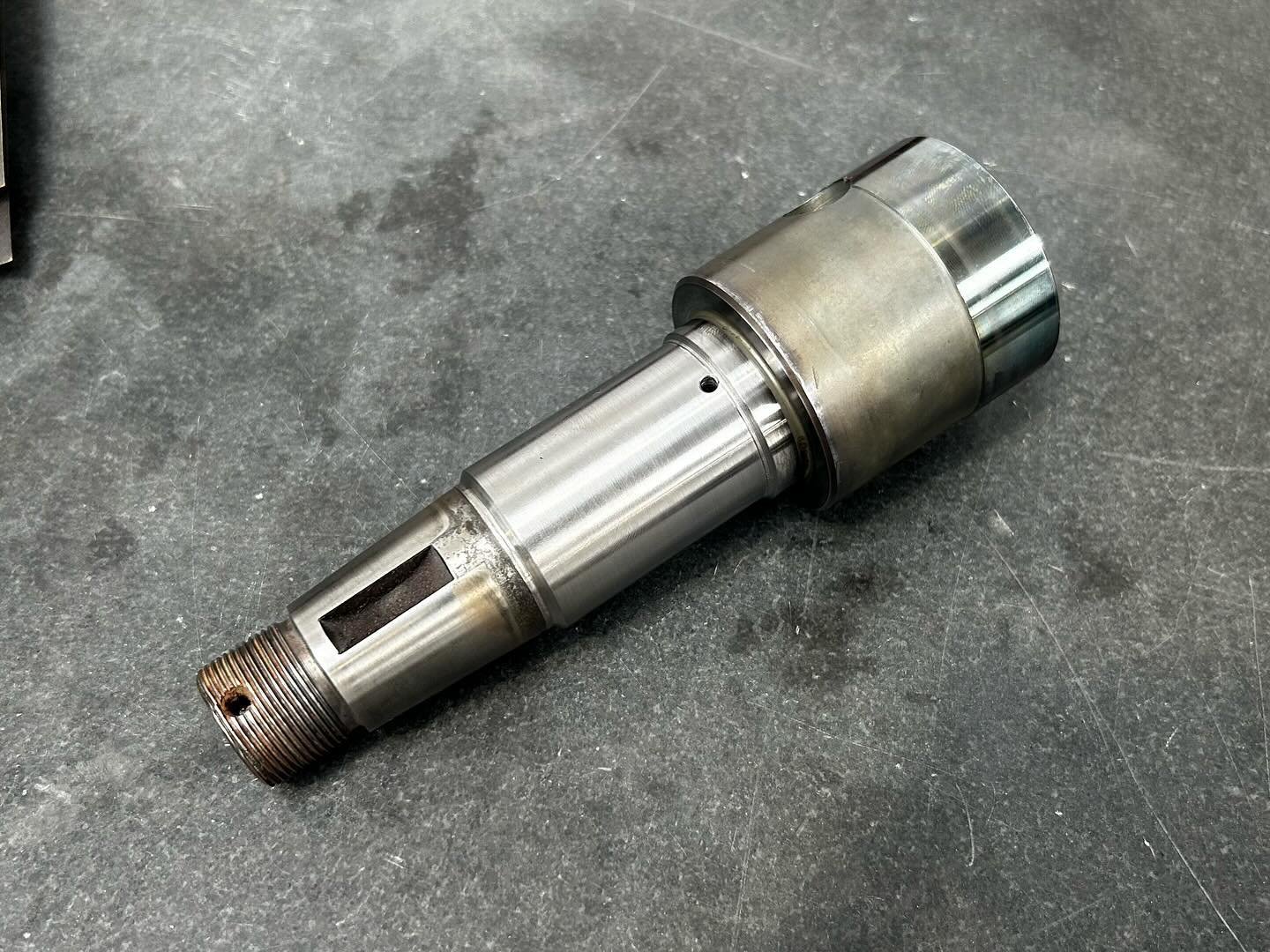 This hydraulic motor shaft had some wear from a spun bearing, we managed to repair it by building the journal back up with weld and then machining down back to the correct size.
