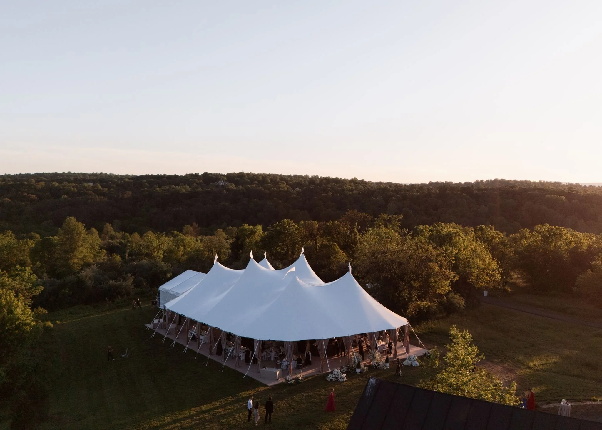 tented wedding in the meadow outside