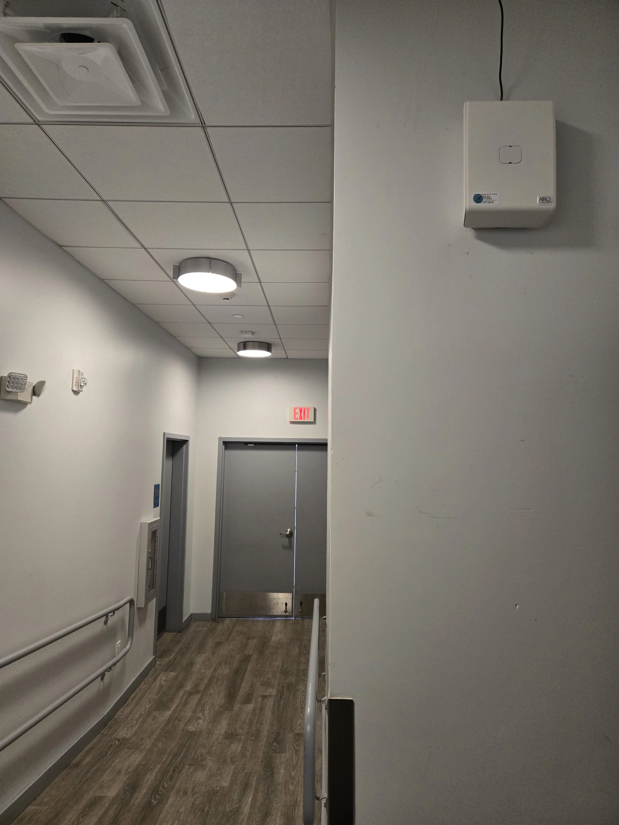 ambient hallway community living space scenting odor control