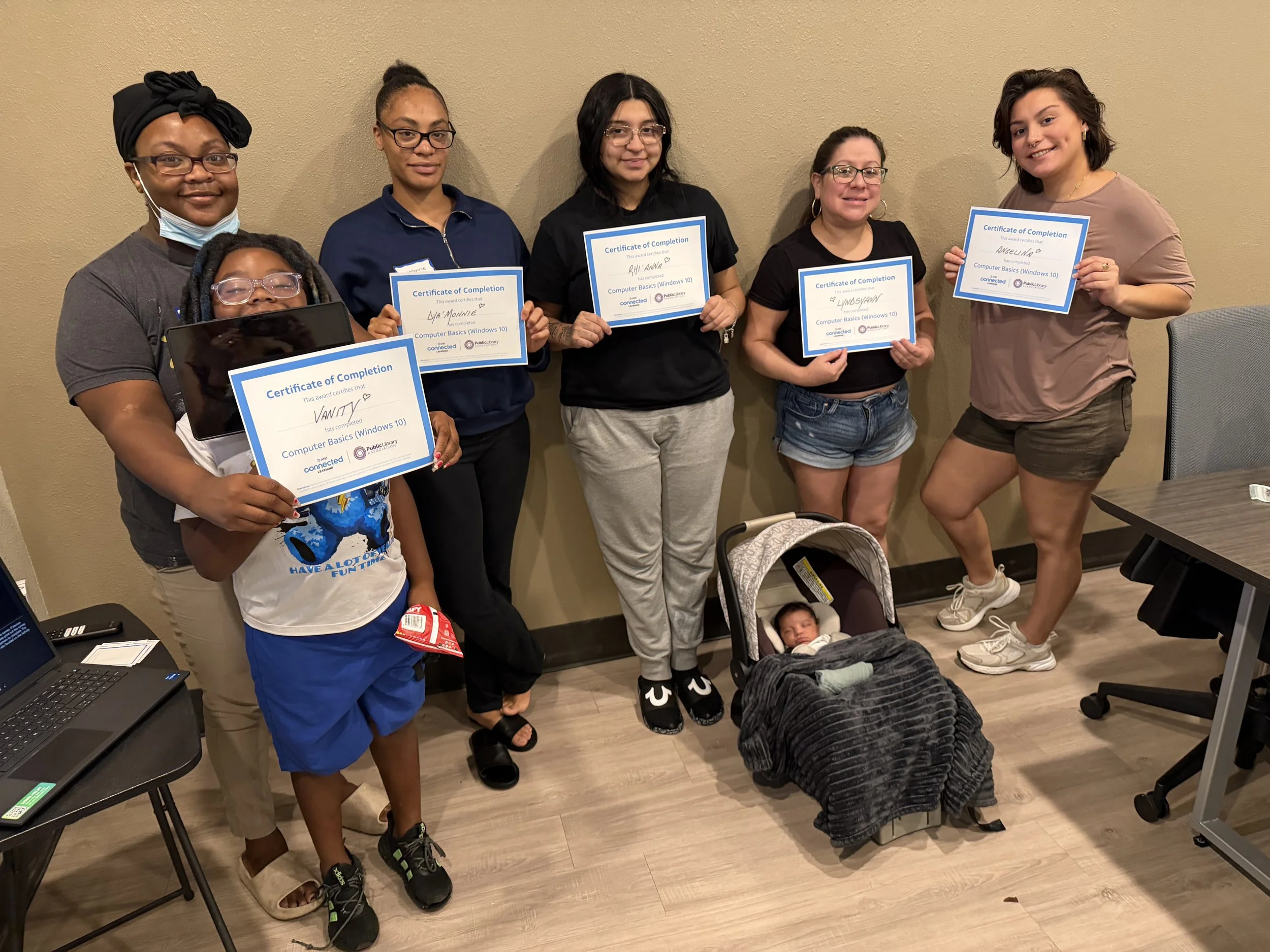 Digital Literacy Workshop participants after successfully completing a class held at The Bridge Ministries in Bryan, Texas.