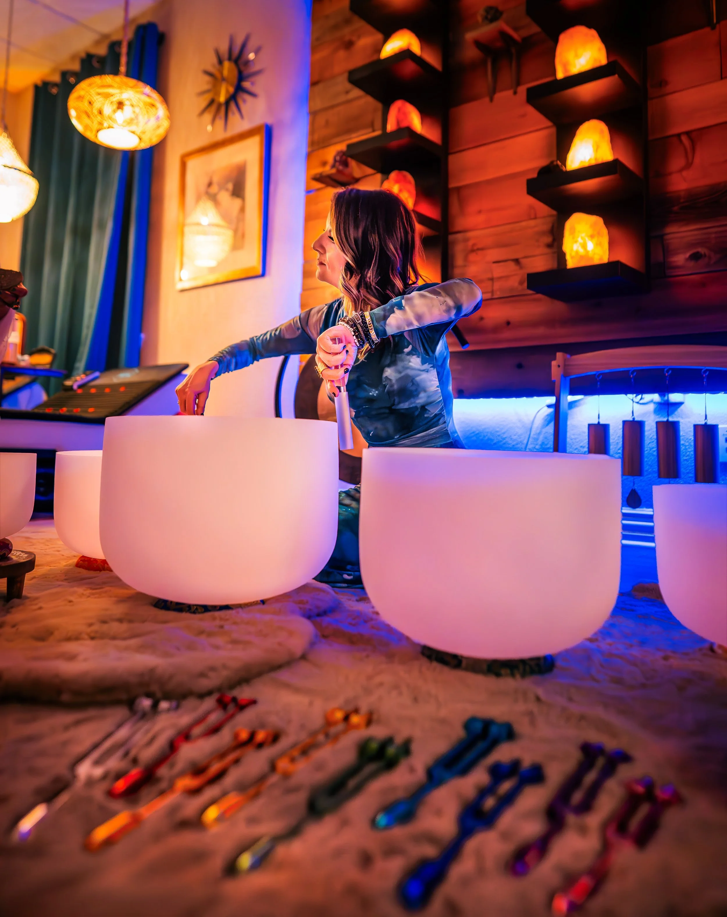 Sound bath crystal singing bowls inside lakeside wellness