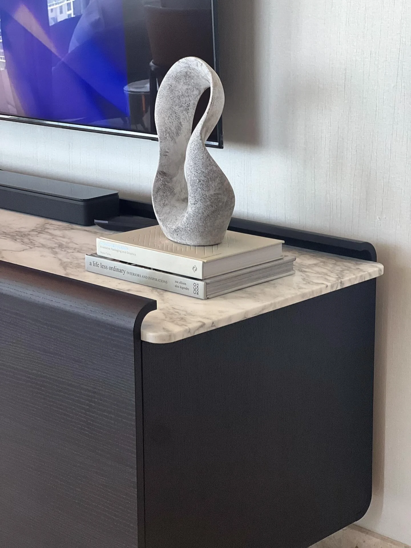 &ldquo;Timeless design, Italian craftsmanship. This Flexform TV unit brings understated elegance to the space&mdash;styled with curated books and a soft sculpture to balance form and function. A quiet statement of quality that speaks for itself. to c