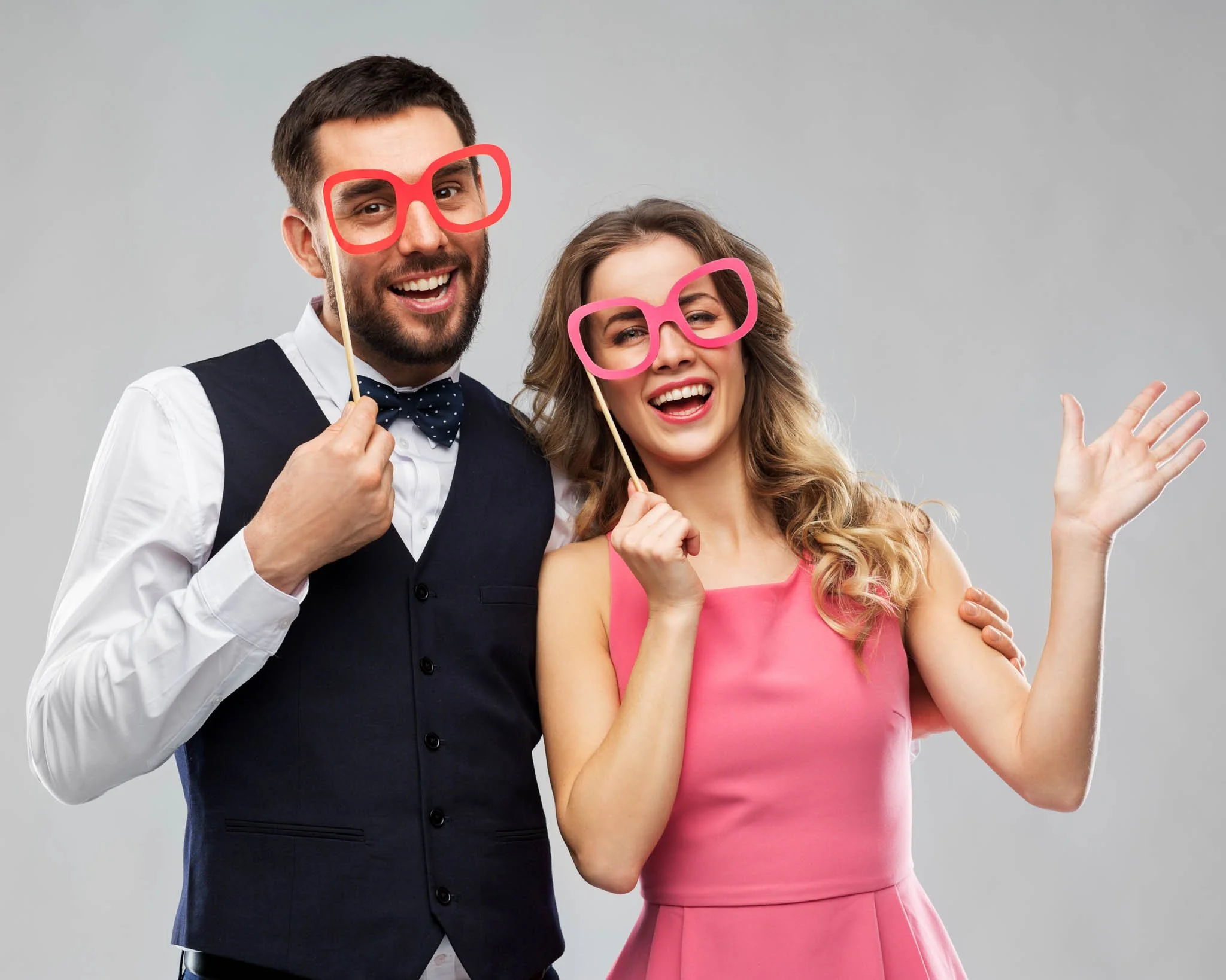 Event Photo Booth Portrait of Couple Posing with Props