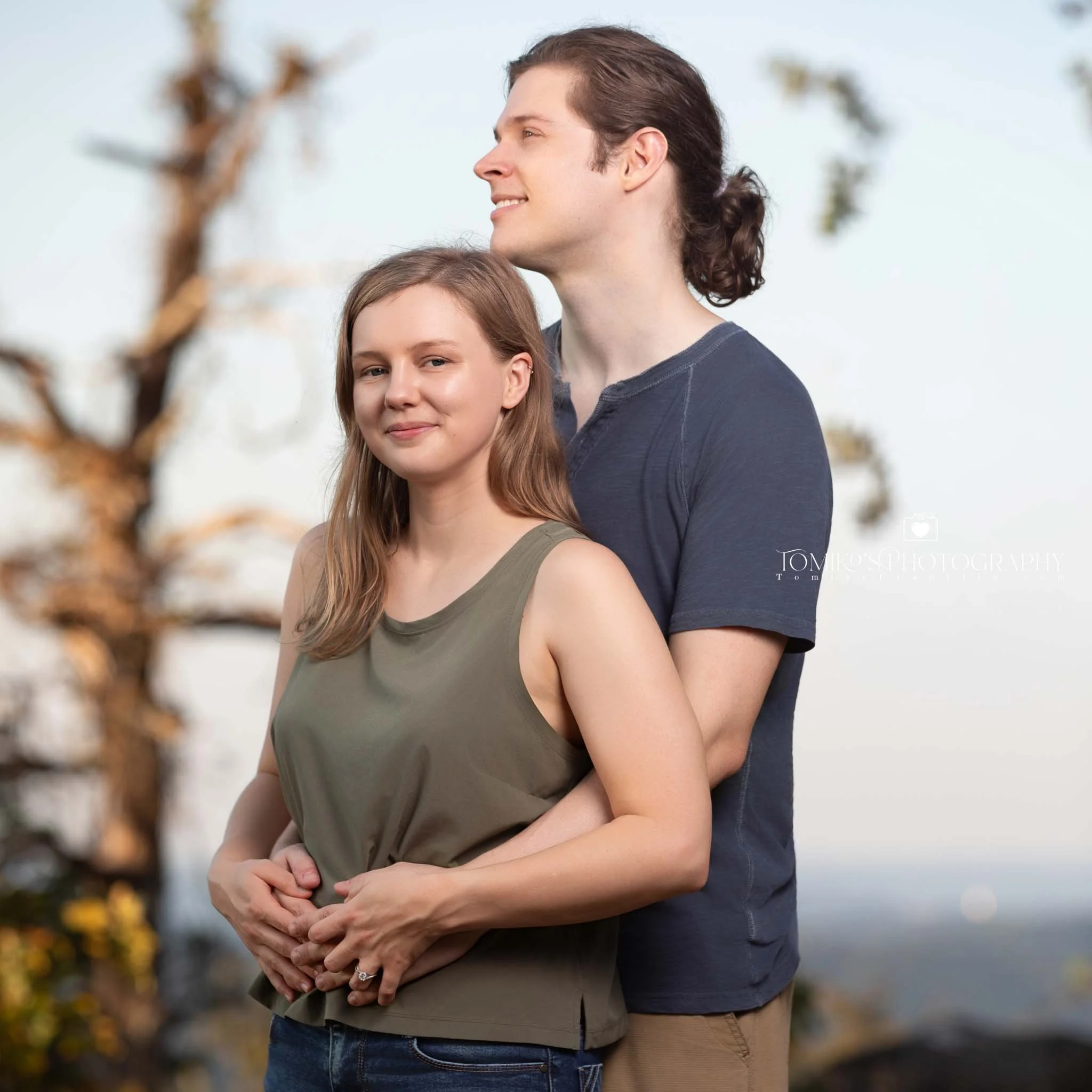 He proposes during a sunset walk at Oak Mountain State Park, photographed in a warm, editorial style.
