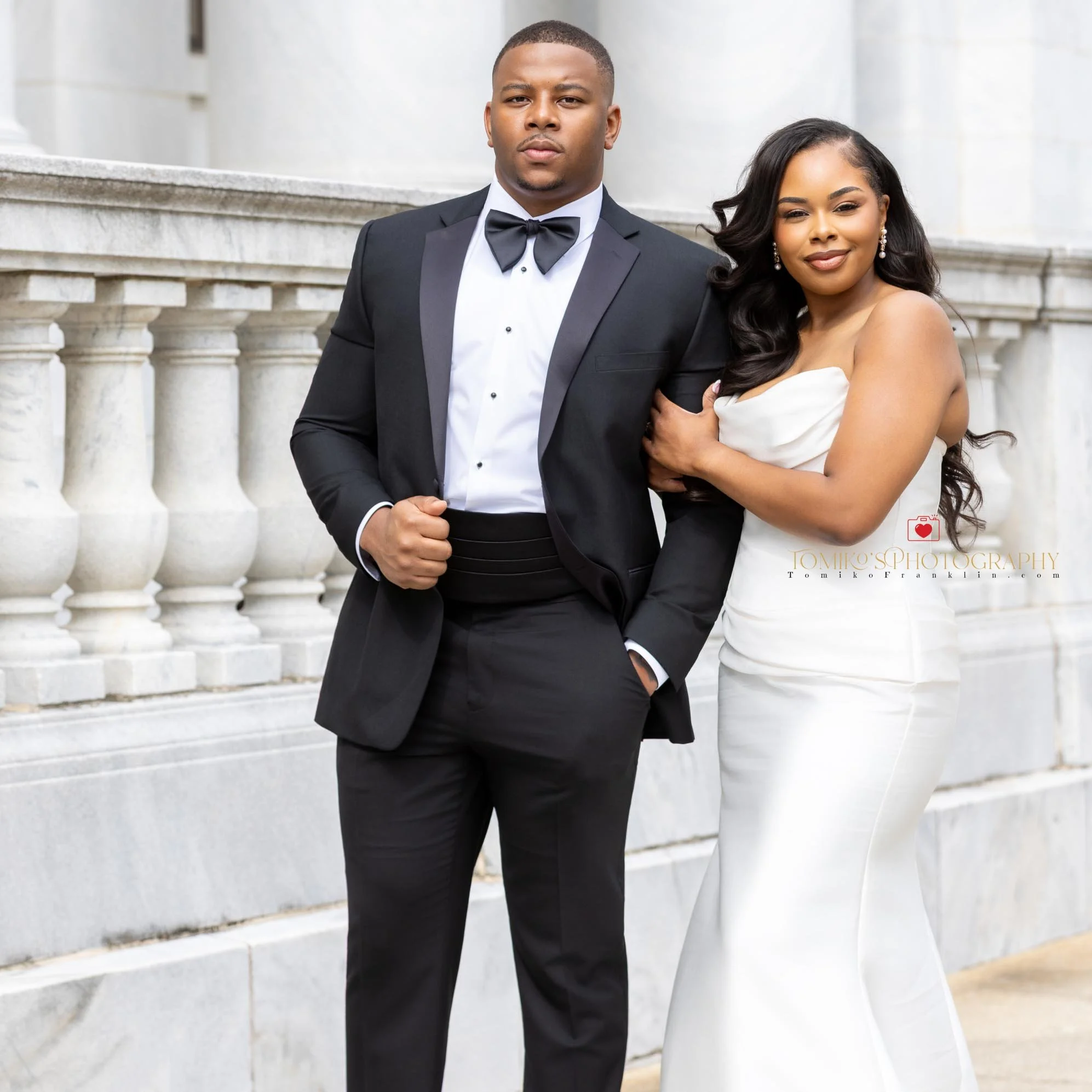 Couple celebrating their elopement with portraits in downtown Birmingham.