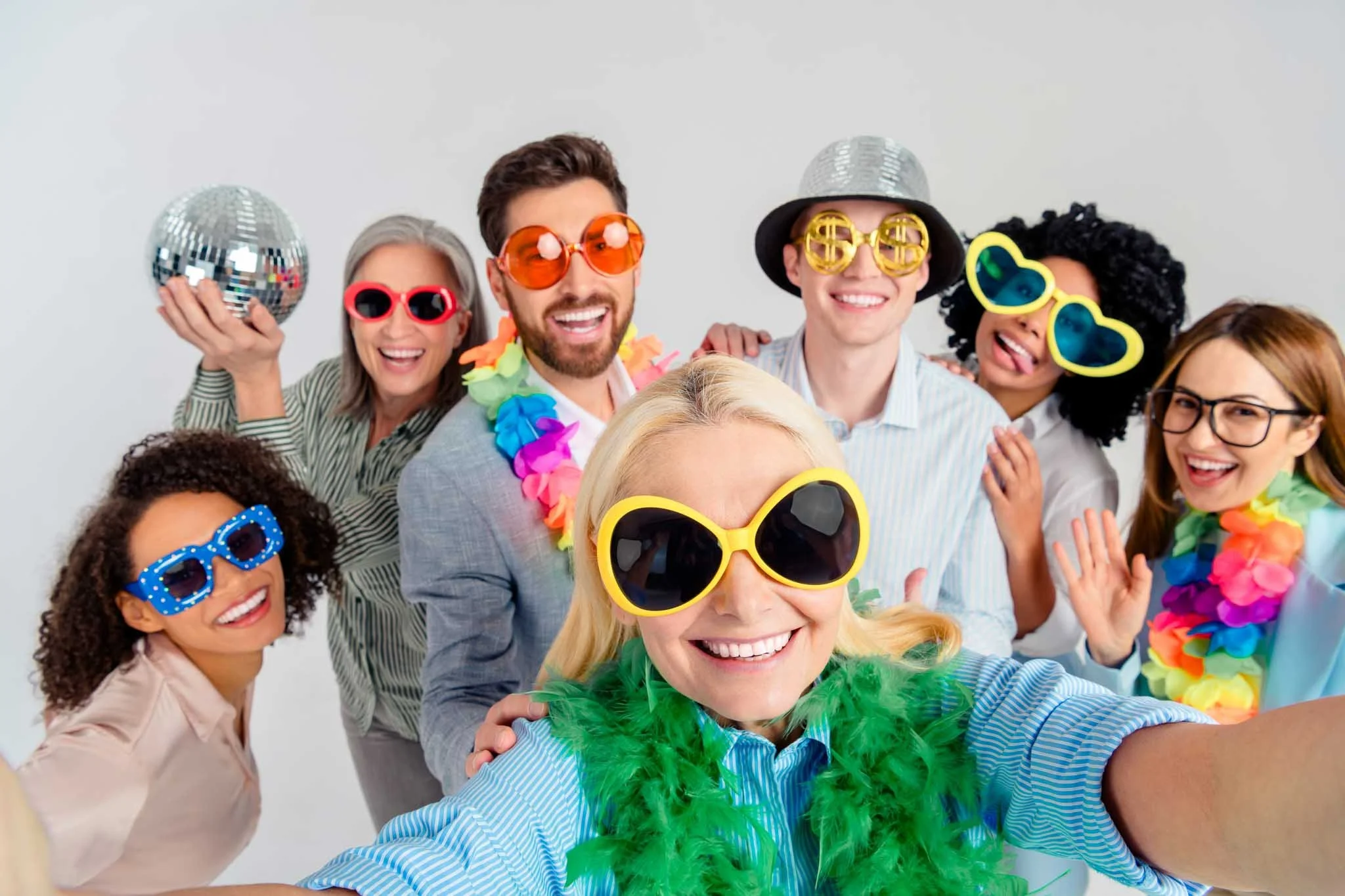 Fun photo of women and men in front of Event PHoto Booth in Birmingham, Alabama