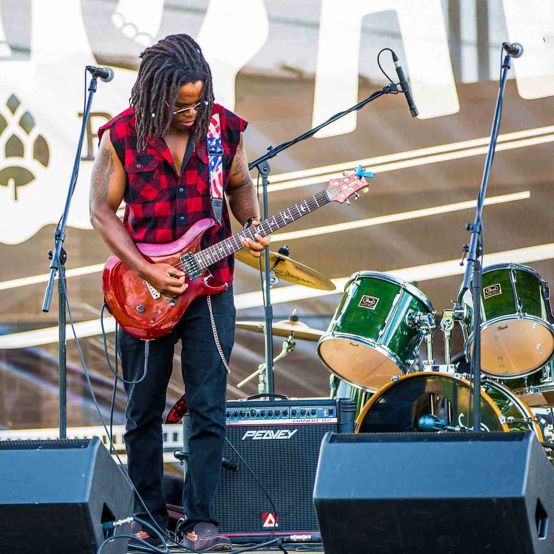 Event photography photo of musician playing a guitar
