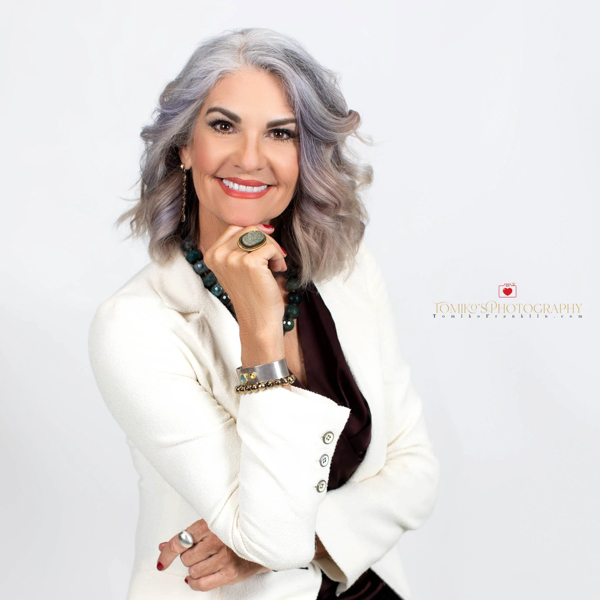 Corporate headshot photographer in Birmingham AL – professional studio branding portrait for woman with white background