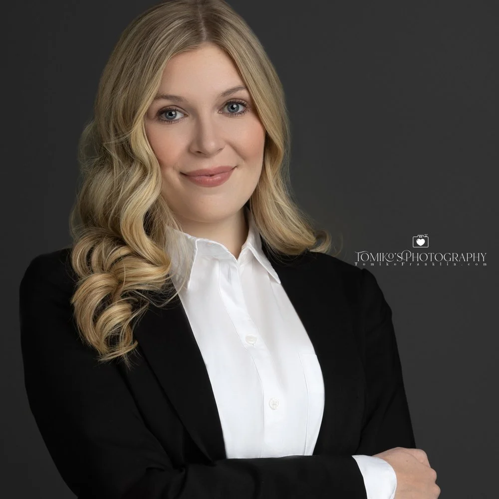 LinkedIn-ready headshot of a young professional in Huntsville