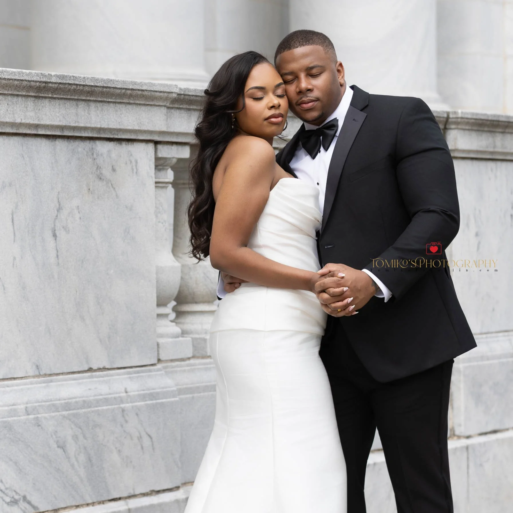Luxury elopement portrait of a Birmingham couple with warm, elegant editing.